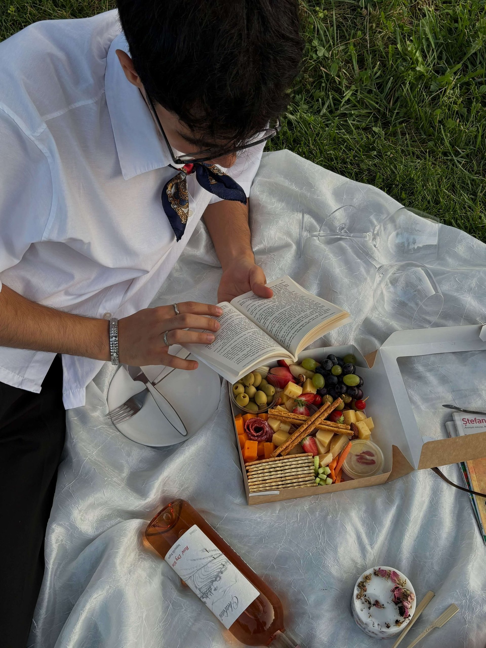 an abstract photo of a curved building with a blue sky in the background