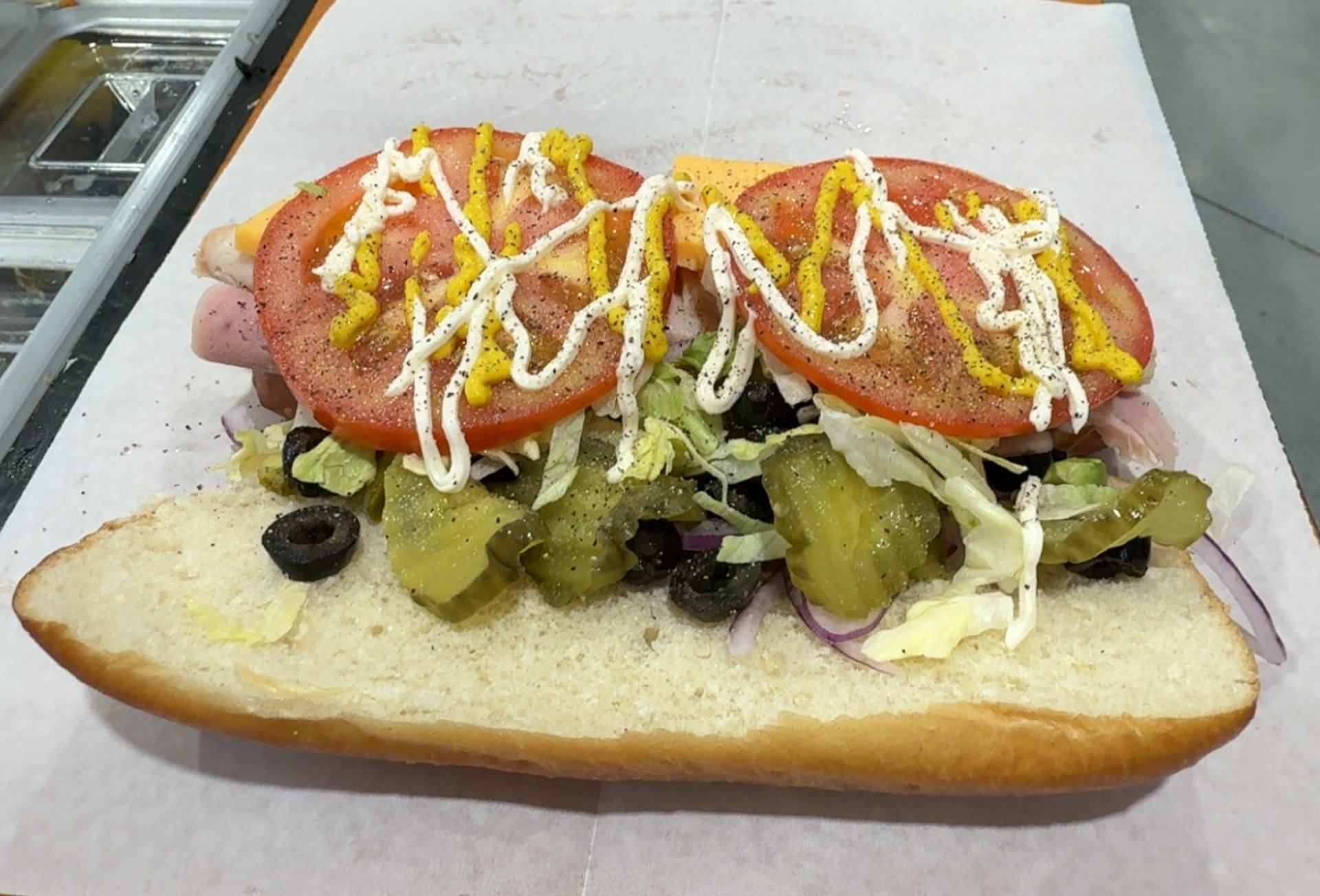 woman wearing yellow long-sleeved dress under white clouds and blue sky during daytime