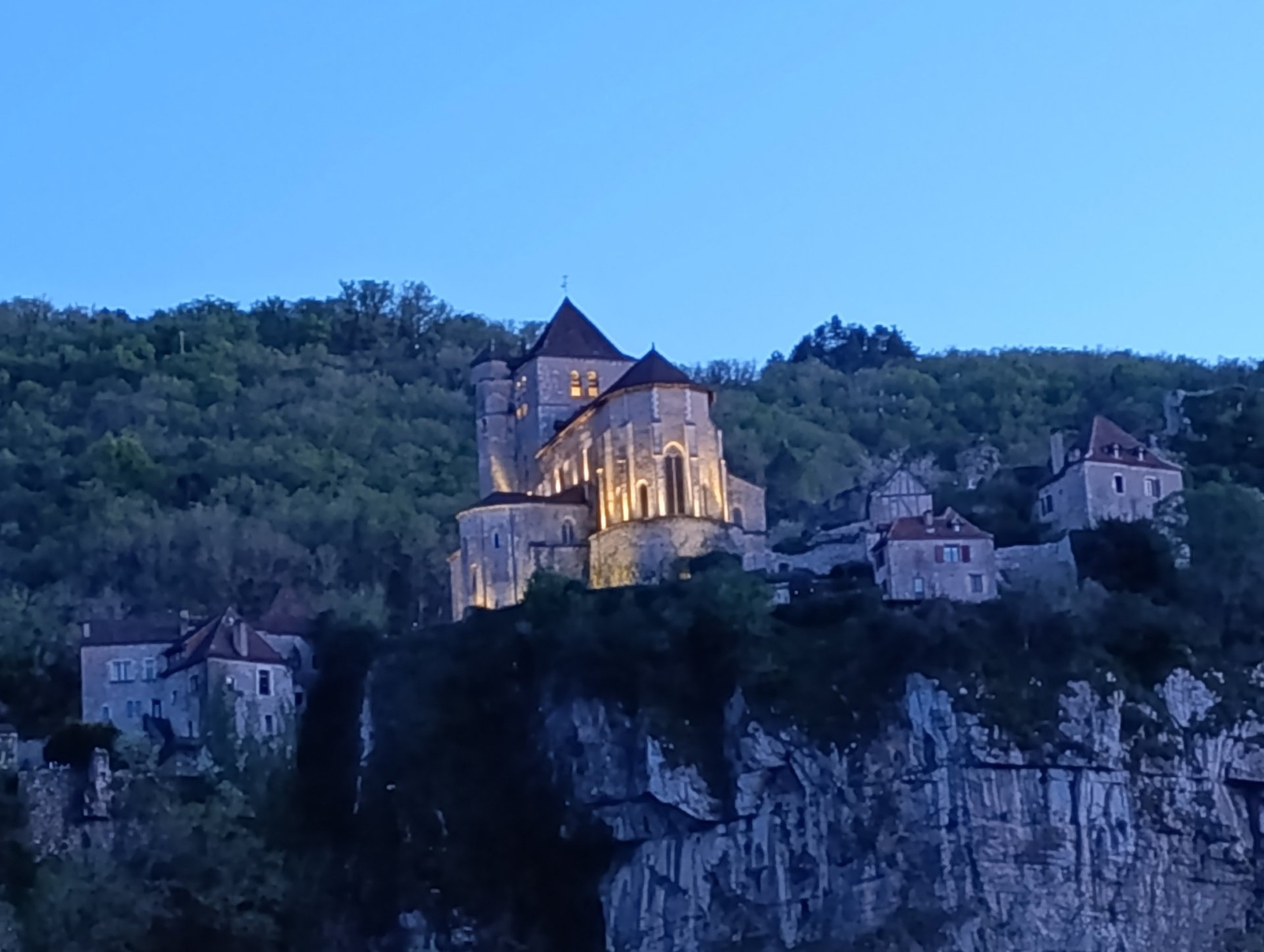 woman wearing yellow long-sleeved dress under white clouds and blue sky during daytime