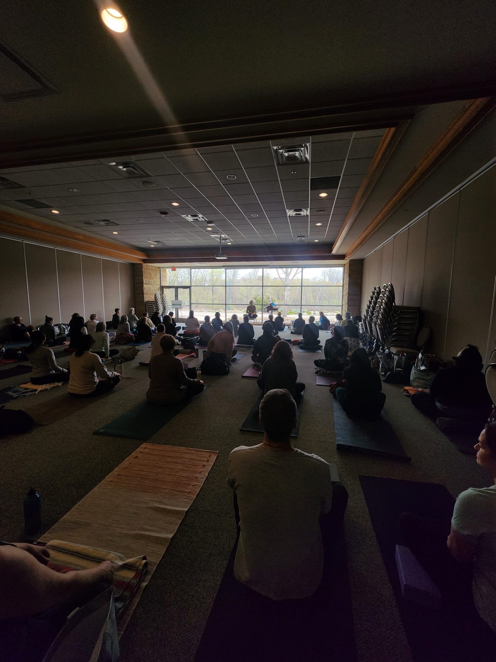 an abstract photo of a curved building with a blue sky in the background