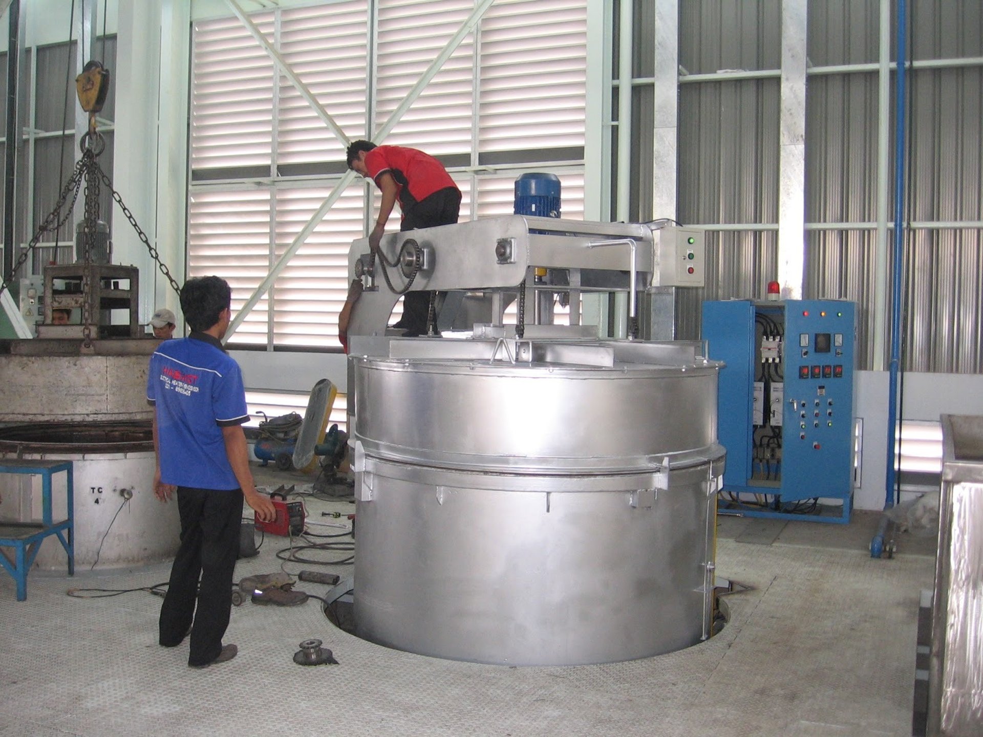 a close up of a black and brown abstract painting