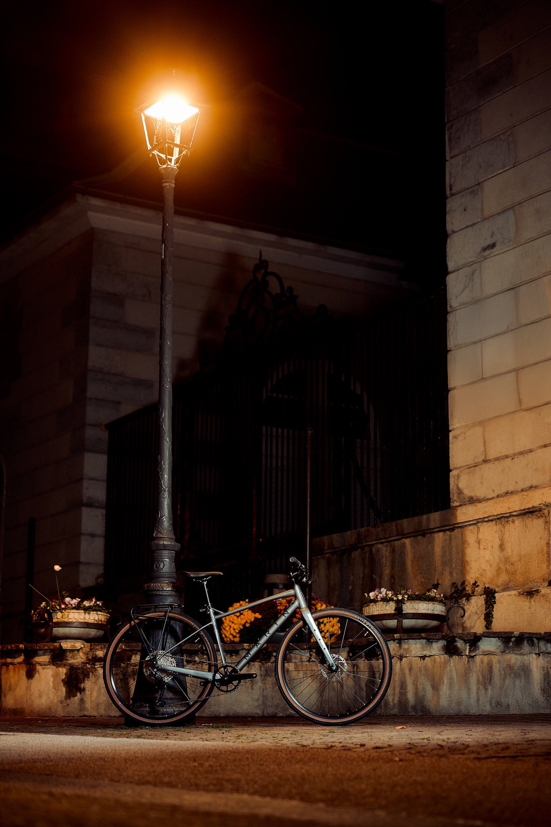 an abstract photo of a curved building with a blue sky in the background