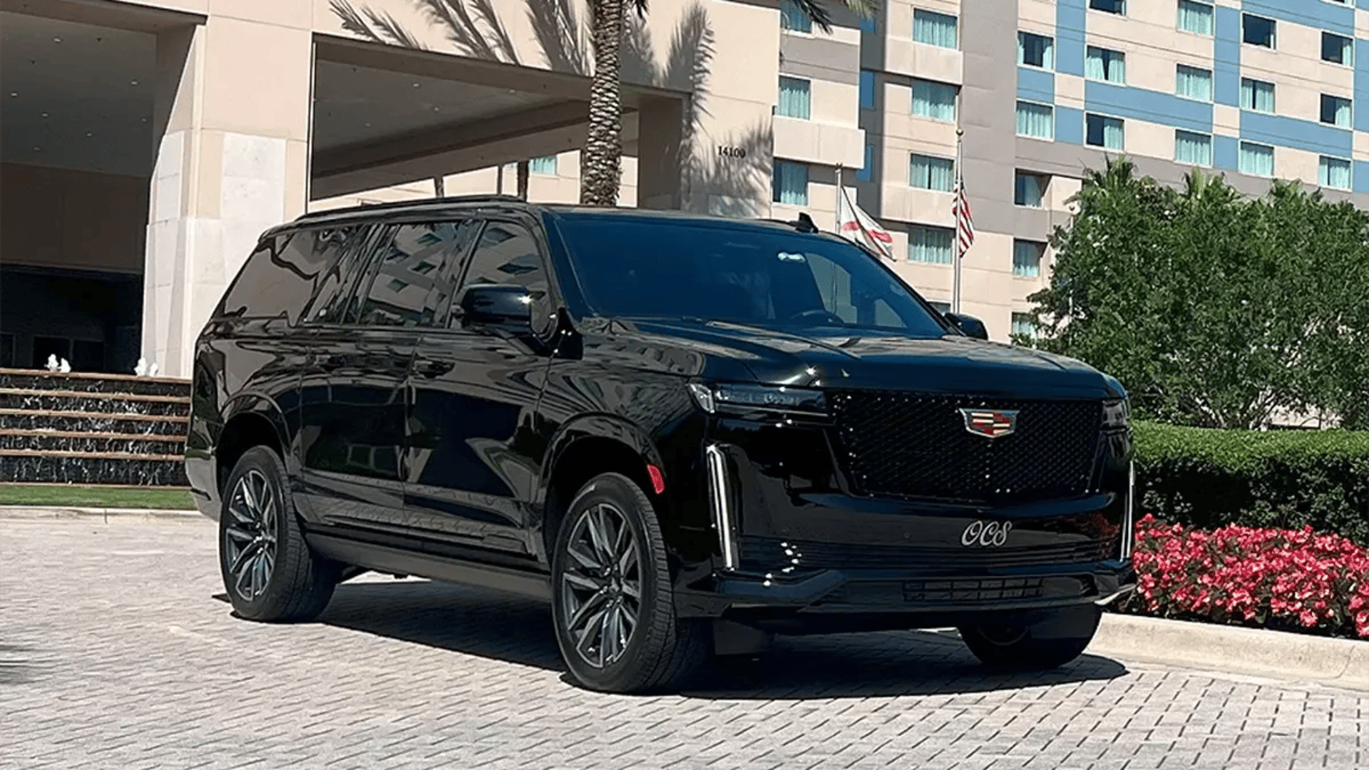 man in black shirt beside woman in black shirt