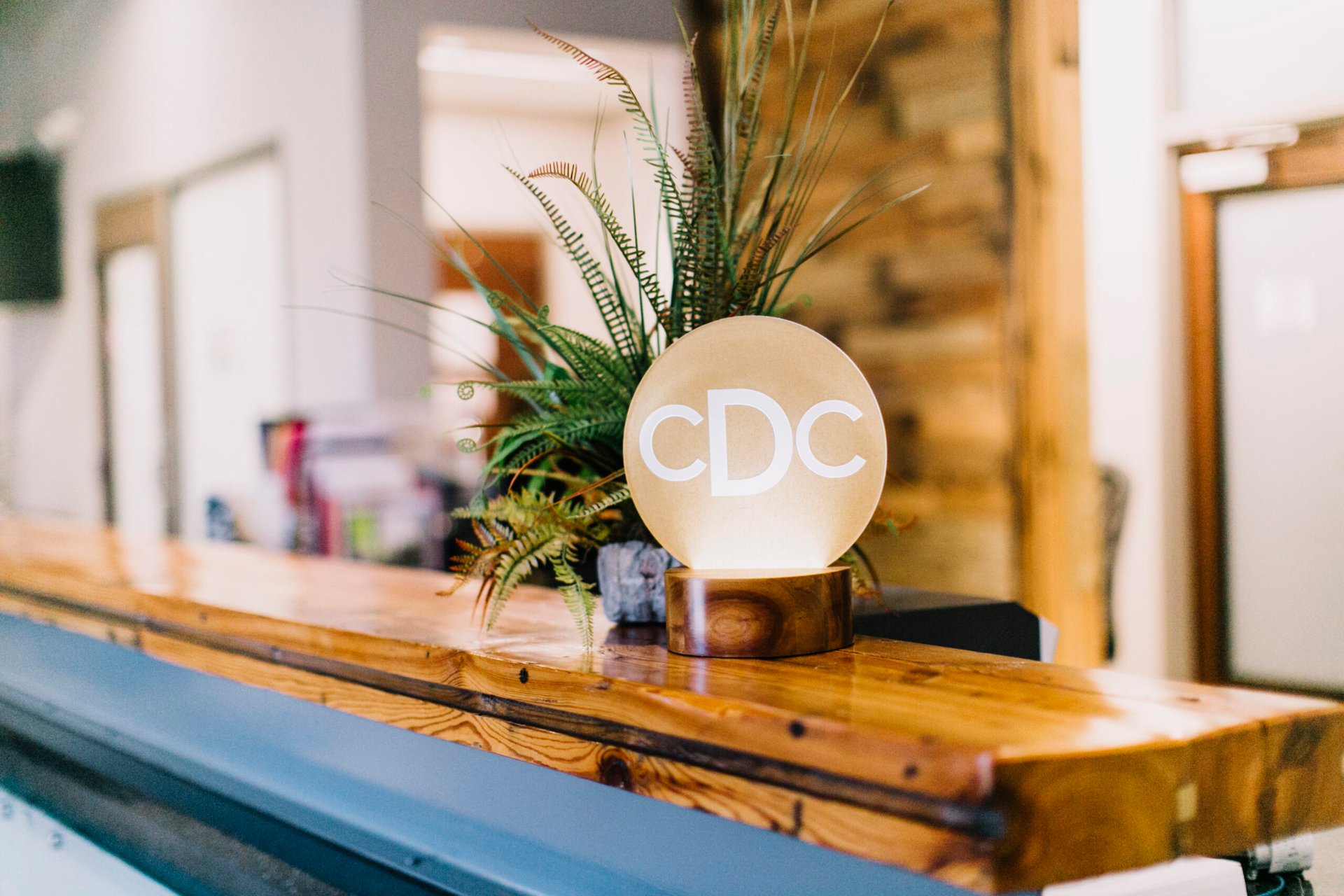 black and brown leather padded tub sofa