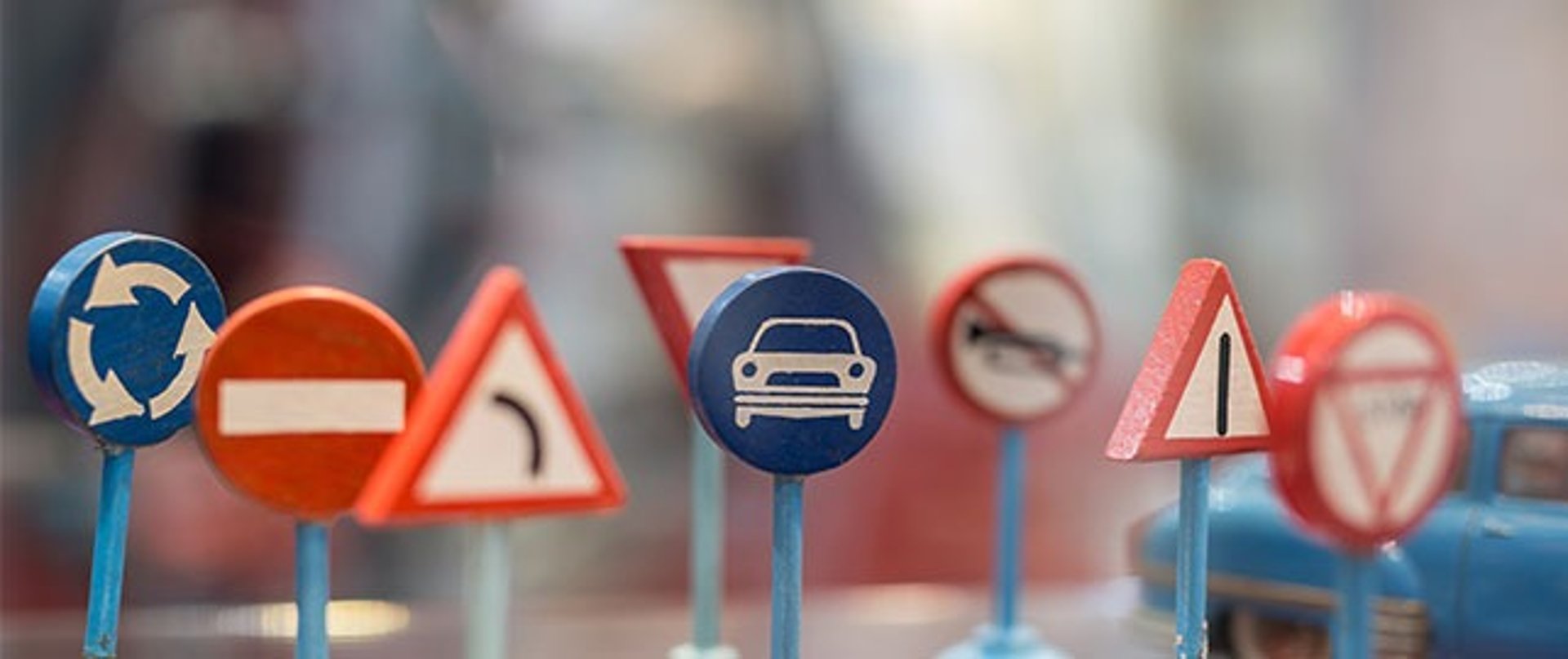 woman wearing yellow long-sleeved dress under white clouds and blue sky during daytime