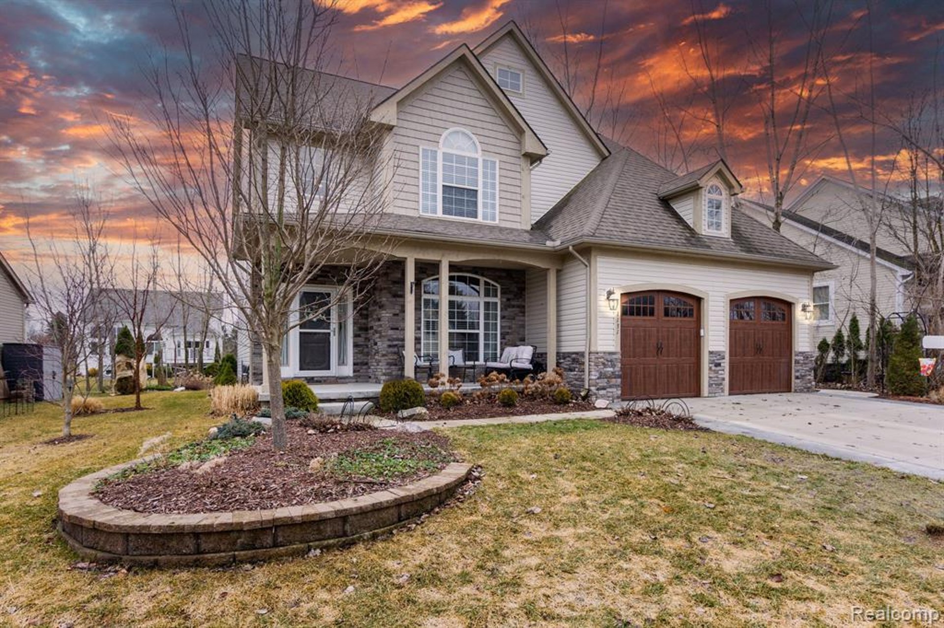 an abstract photo of a curved building with a blue sky in the background
