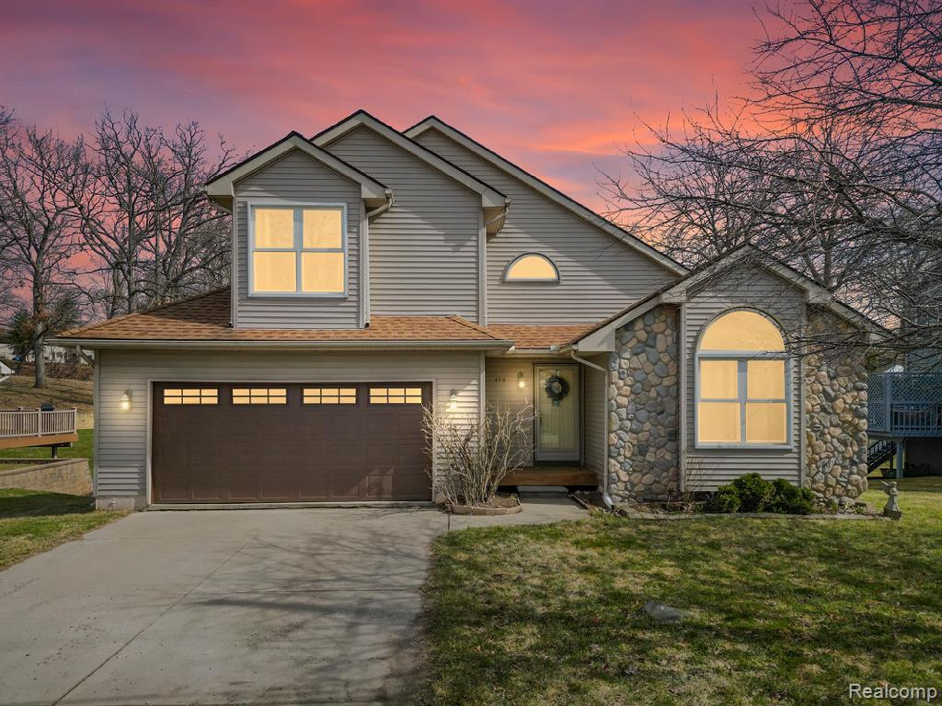 an abstract photo of a curved building with a blue sky in the background