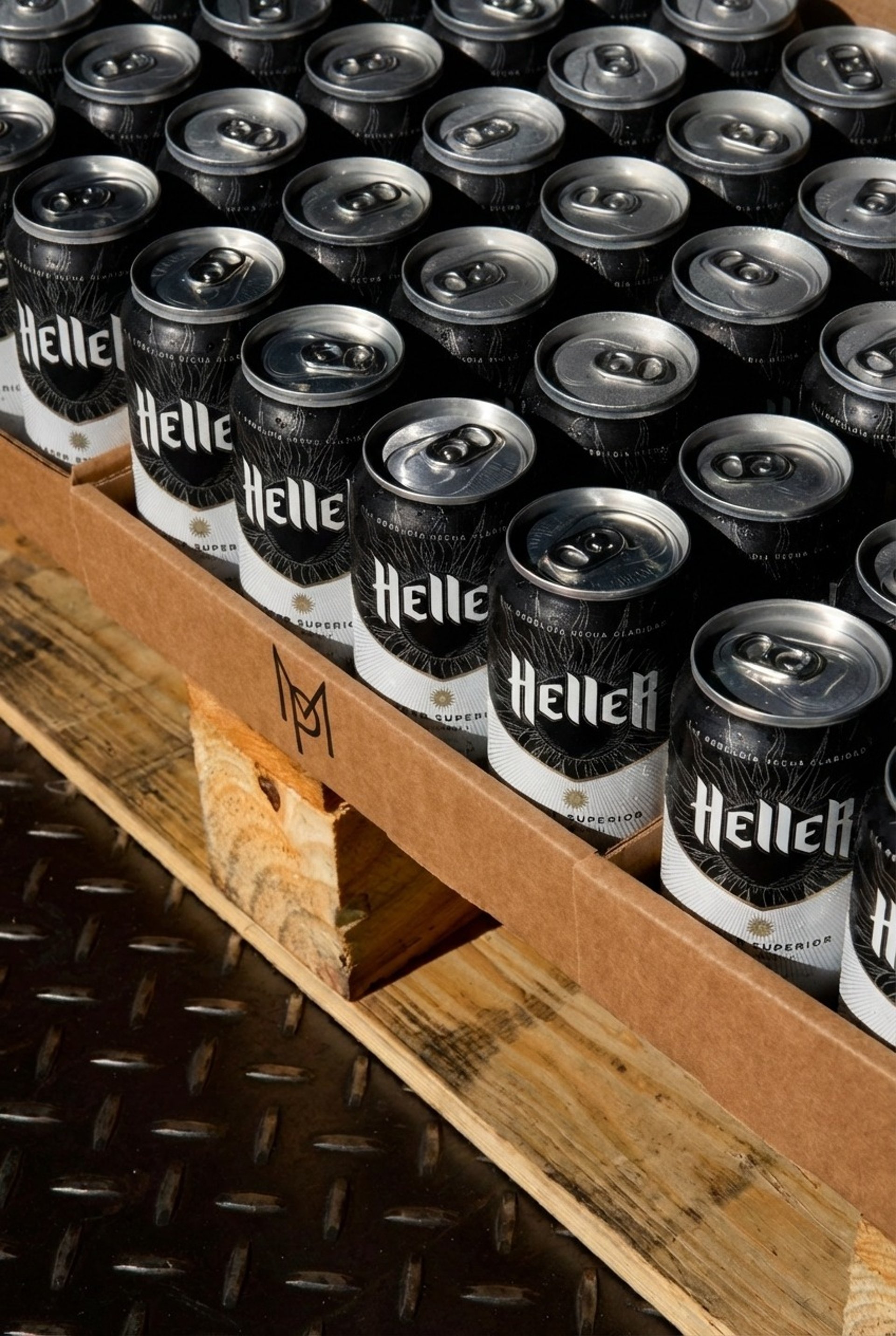 an abstract photo of a curved building with a blue sky in the background