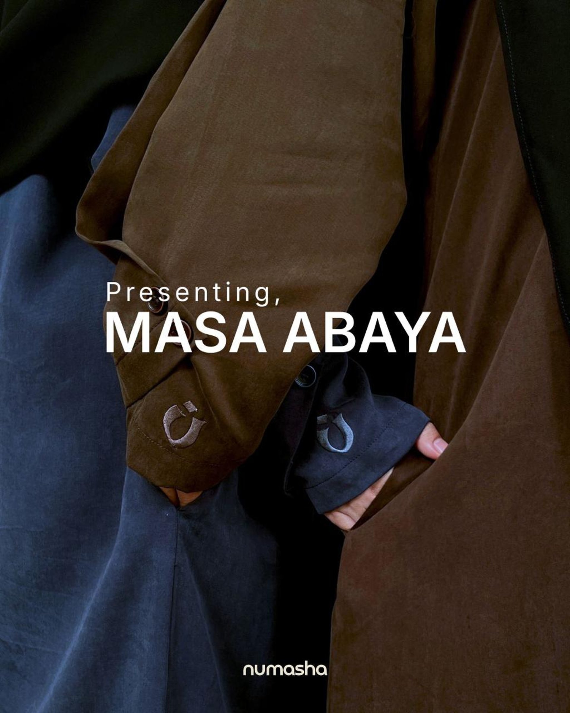 person wearing grey knit sweater