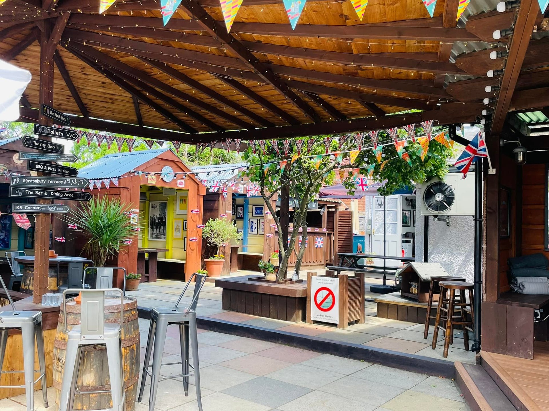 woman wearing yellow long-sleeved dress under white clouds and blue sky during daytime