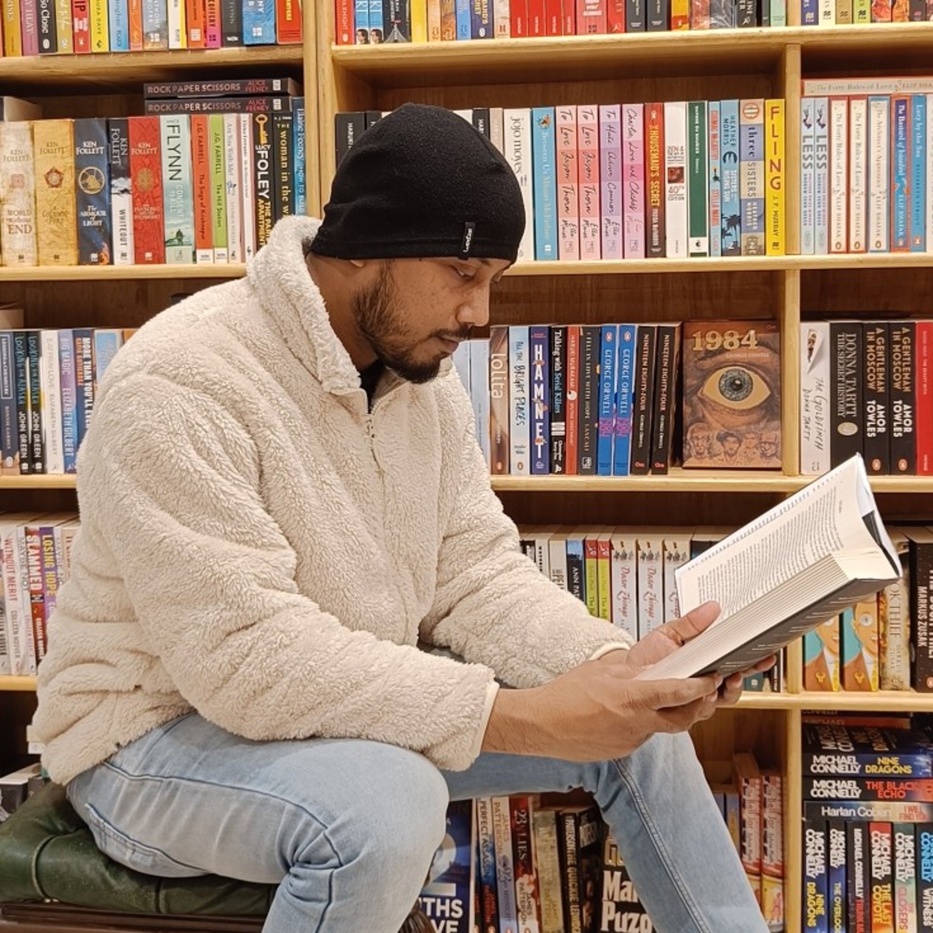 black and brown leather padded tub sofa