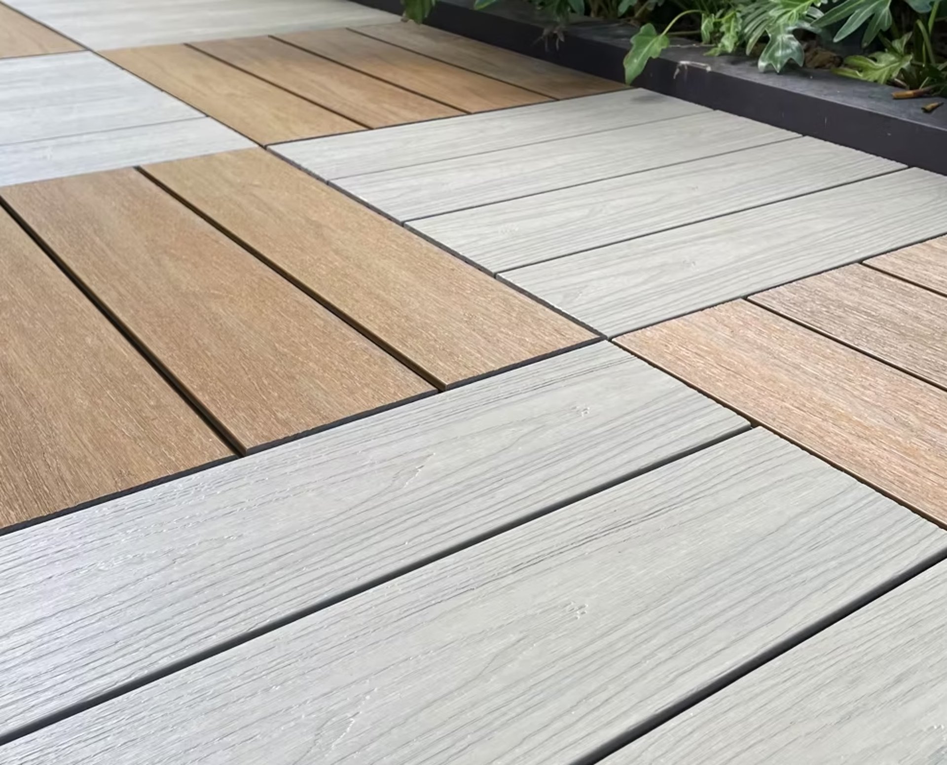 an abstract photo of a curved building with a blue sky in the background