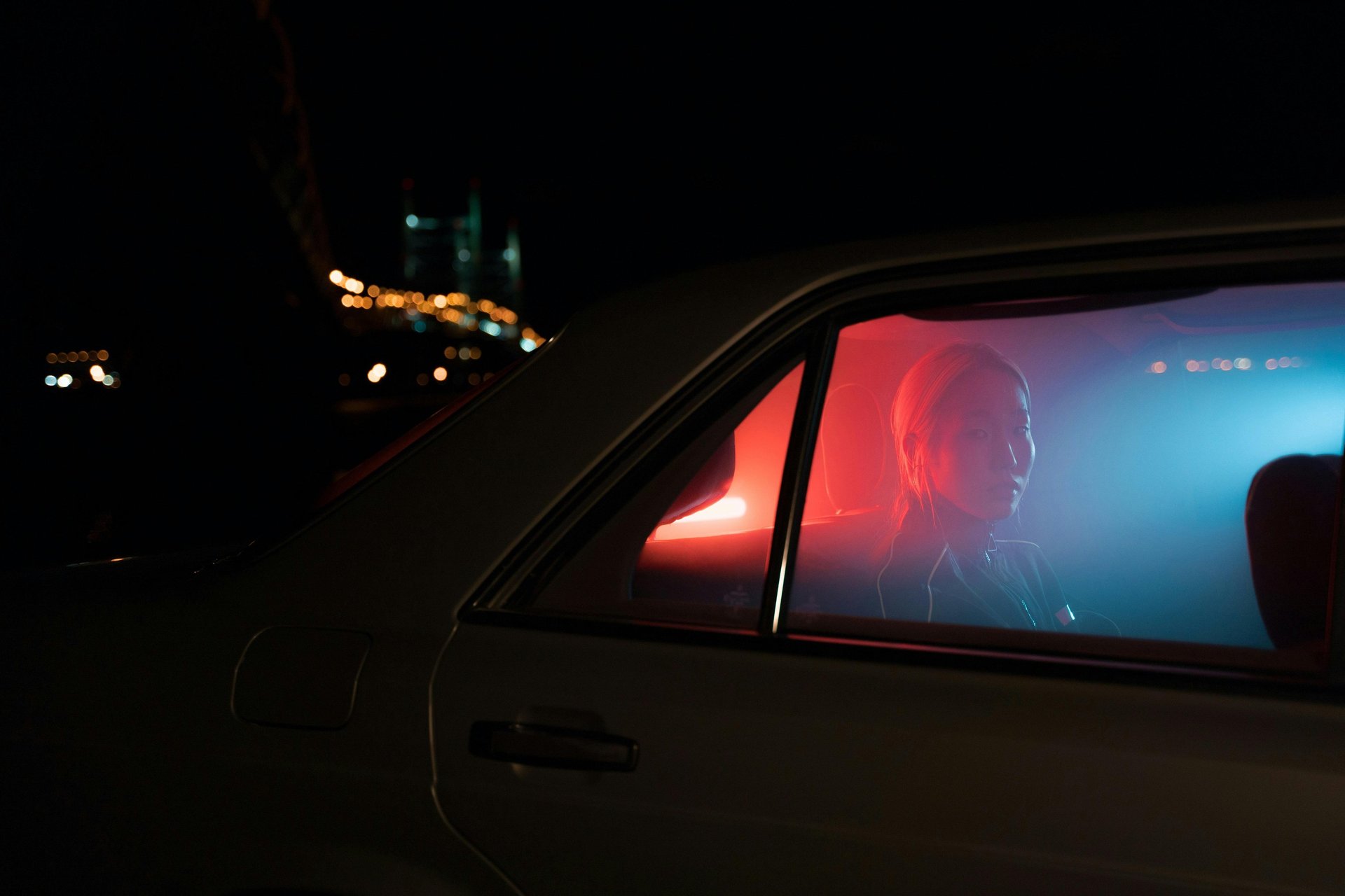 Dark background with glowing orange light and shadow