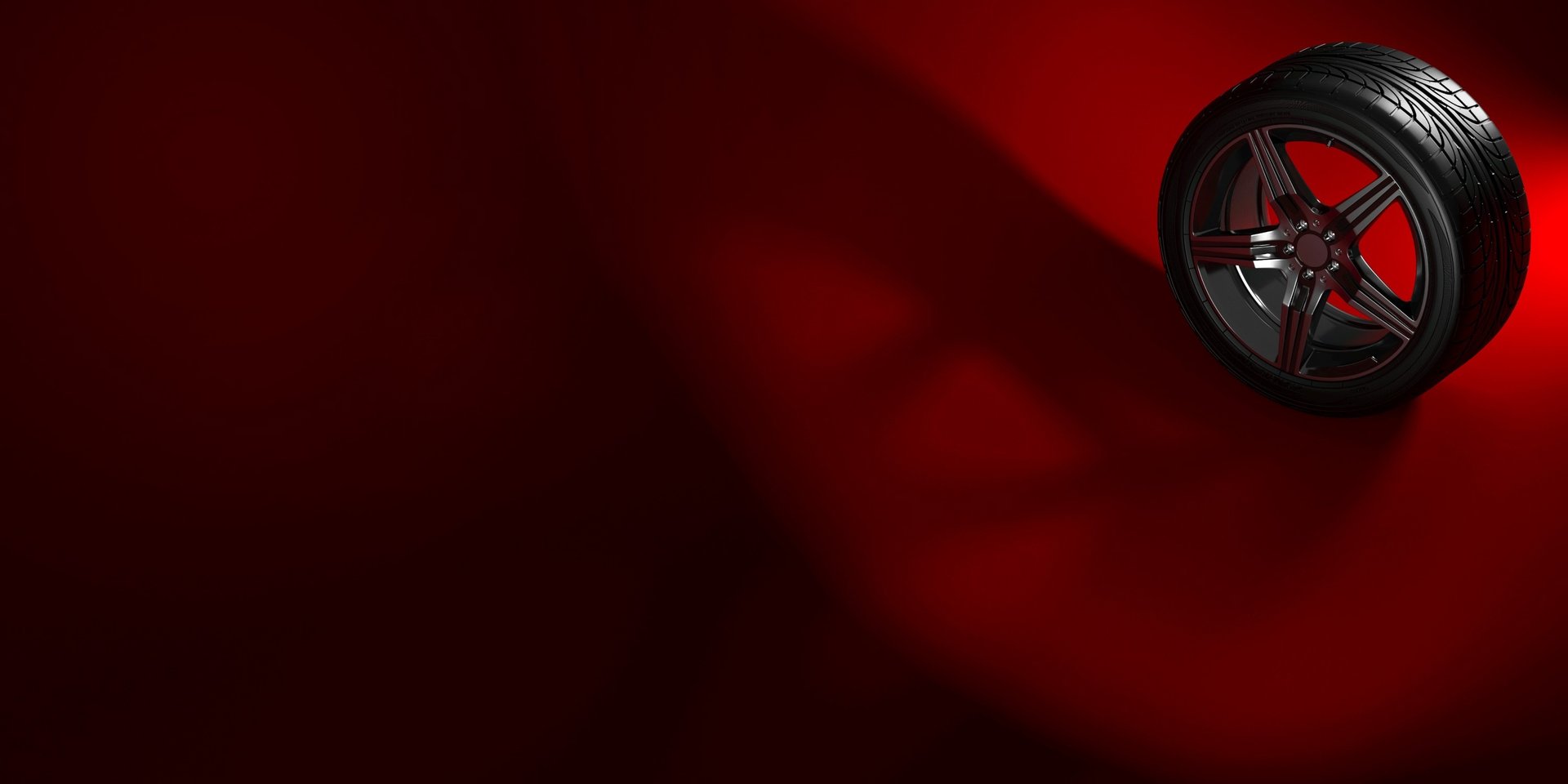 black and white bed near brown wooden table