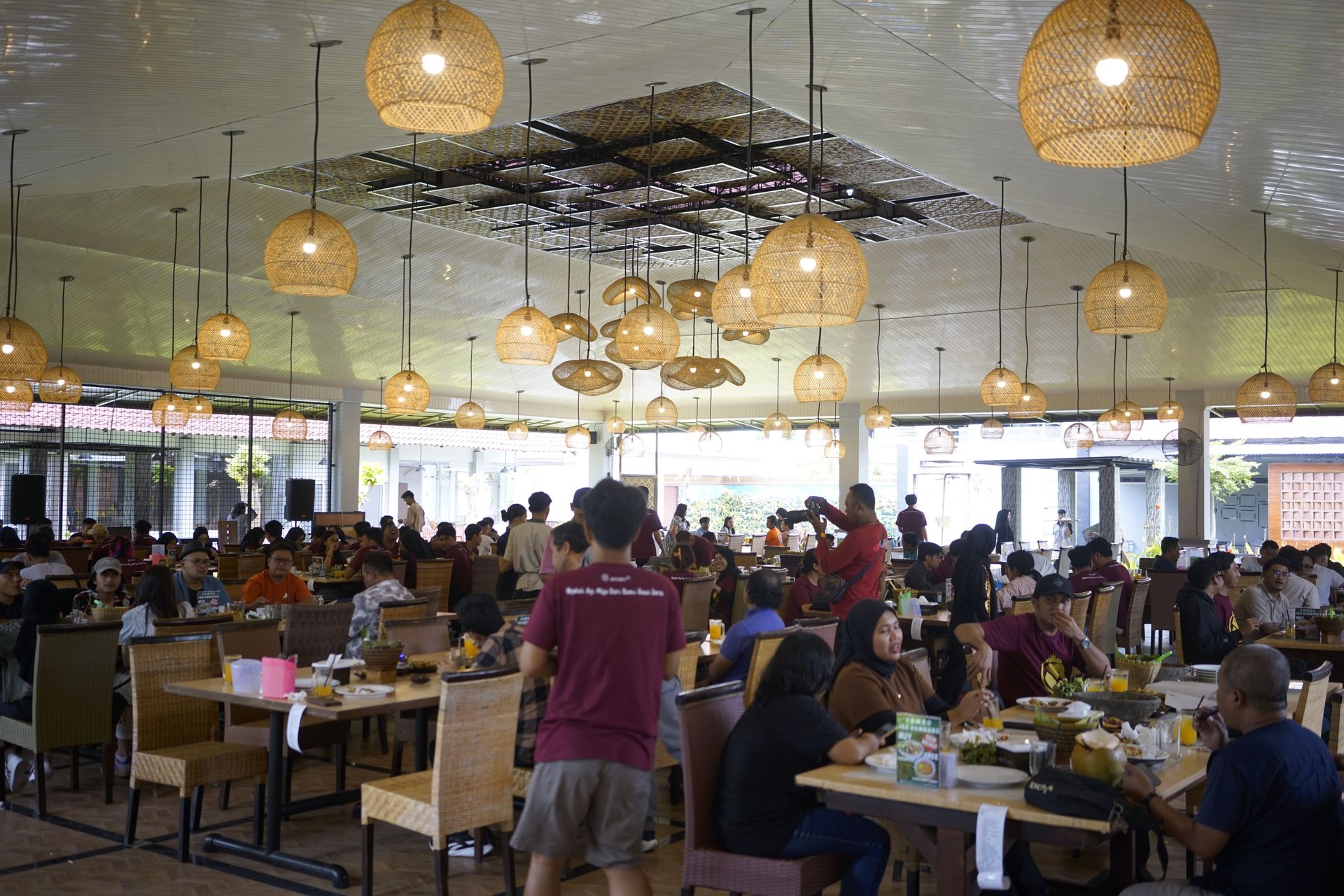 an abstract photo of a curved building with a blue sky in the background