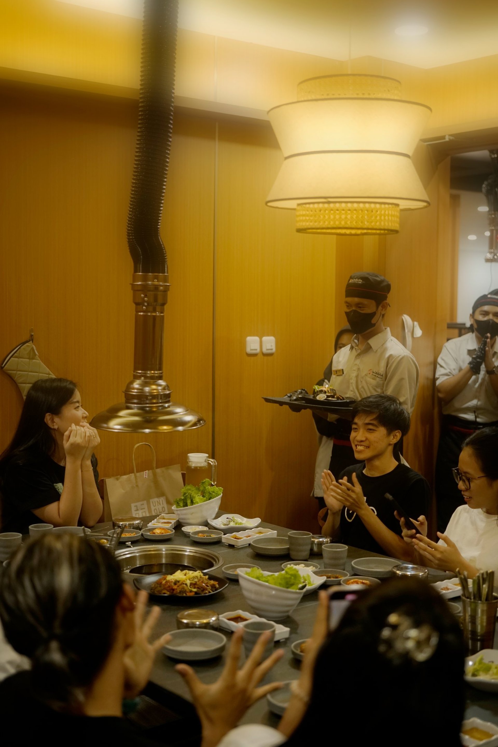 an abstract photo of a curved building with a blue sky in the background