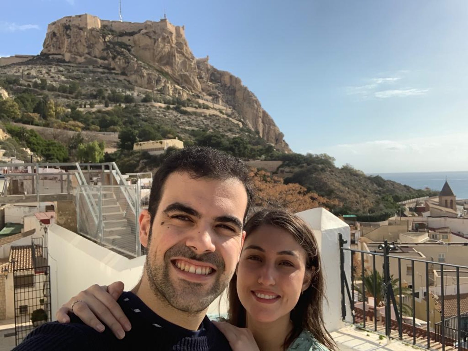couple wearing silver-colored rings