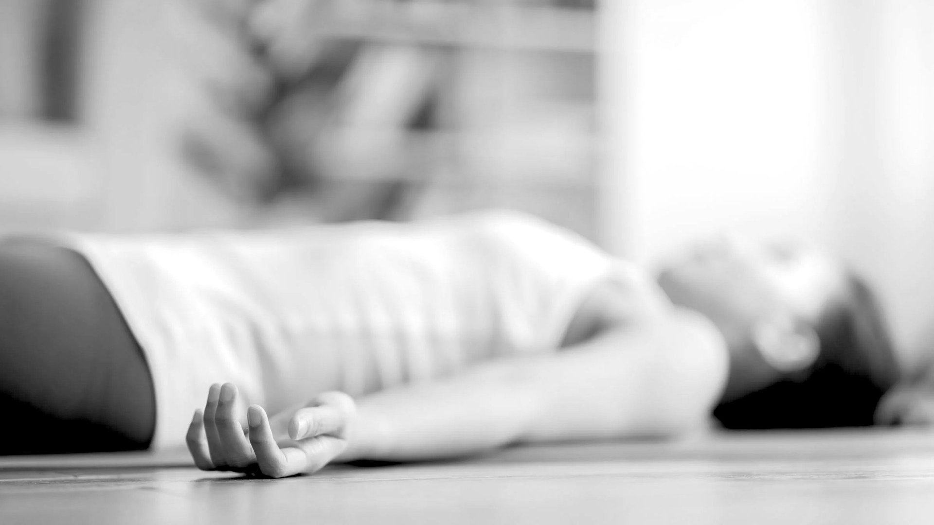 an abstract photo of a curved building with a blue sky in the background