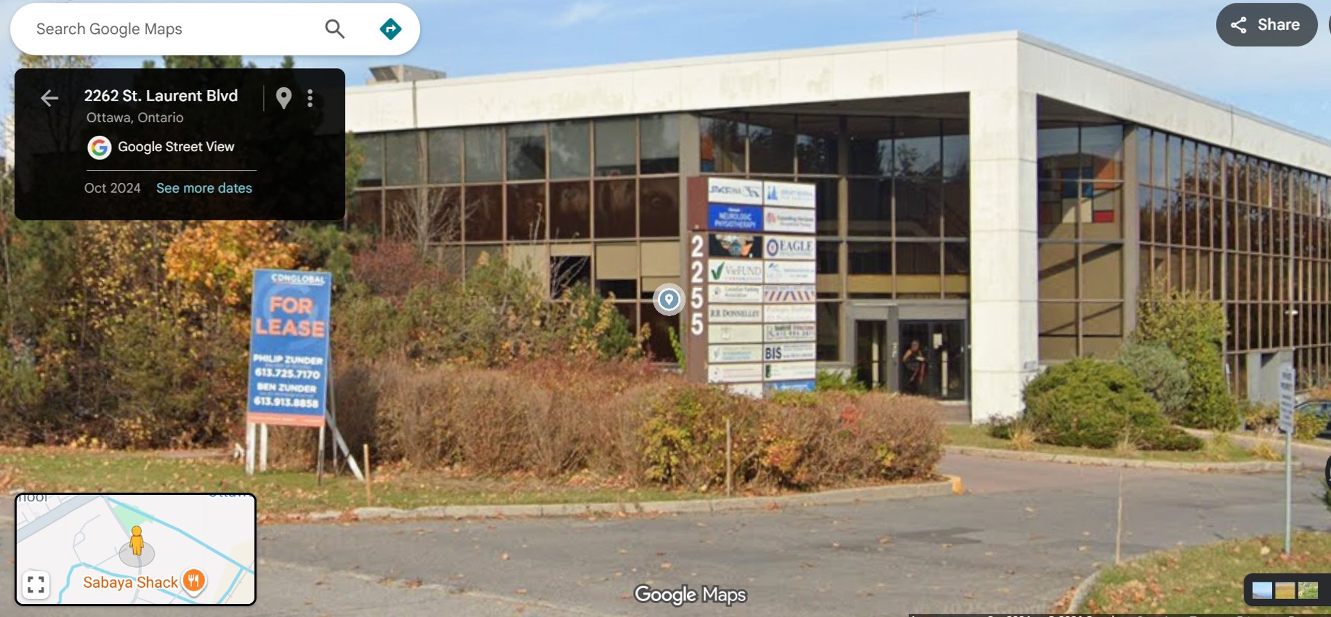 empty hallway between concrete buildings during daytime