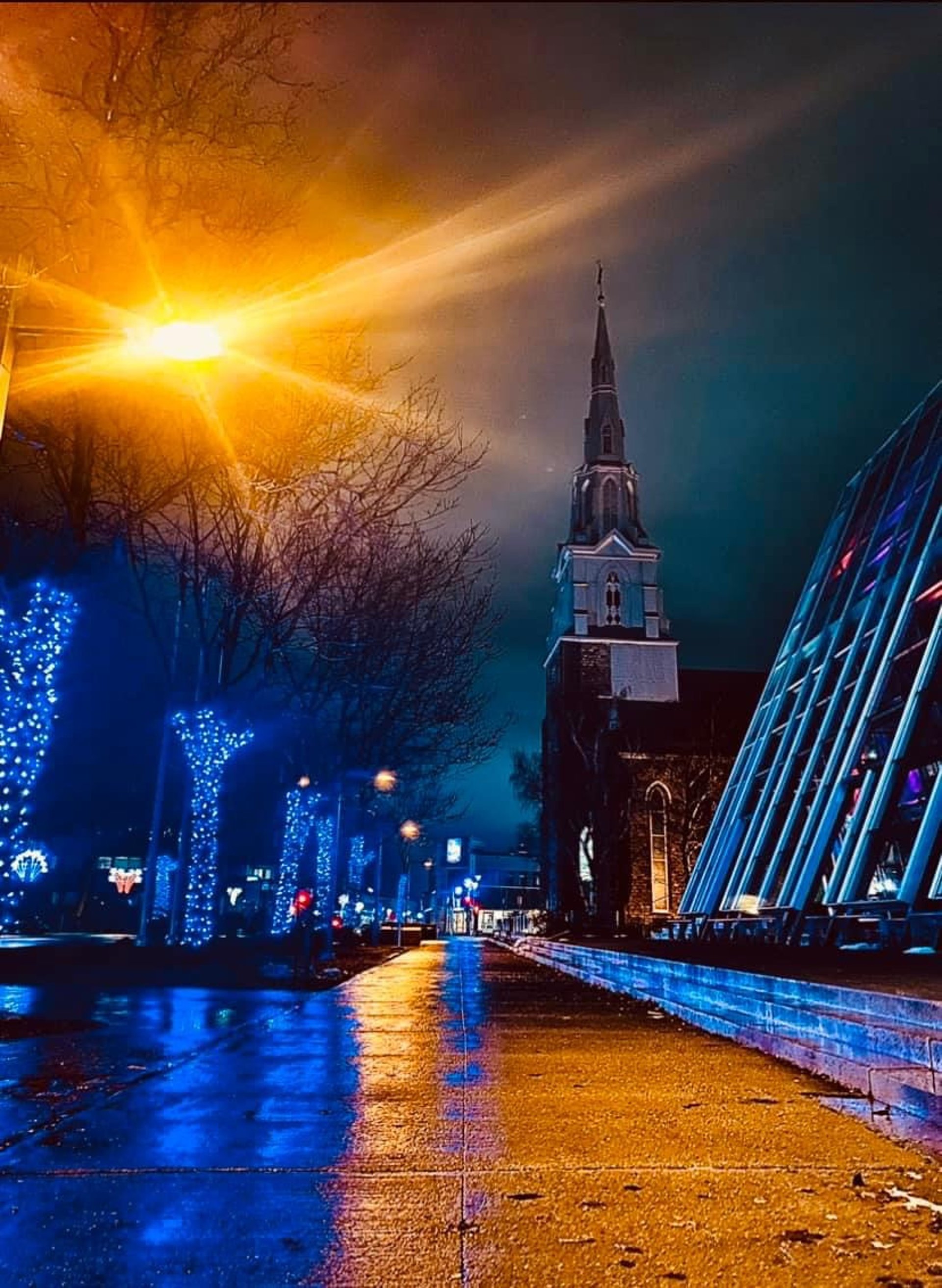 black and brown leather padded tub sofa