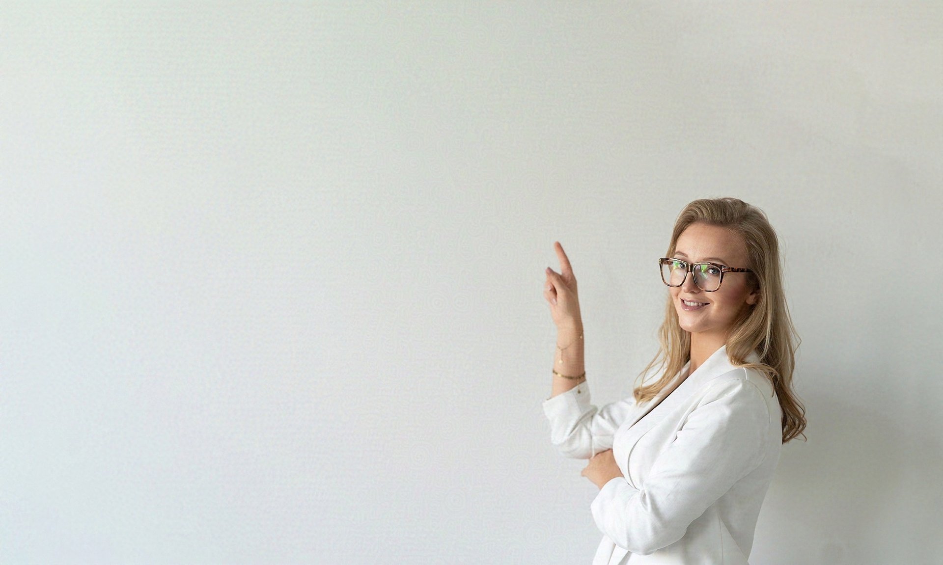 an abstract photo of a curved building with a blue sky in the background