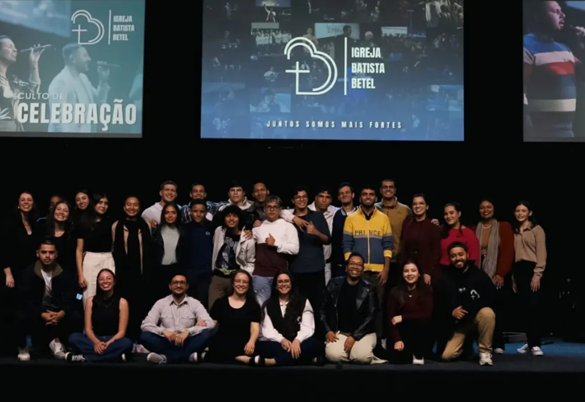an abstract photo of a curved building with a blue sky in the background