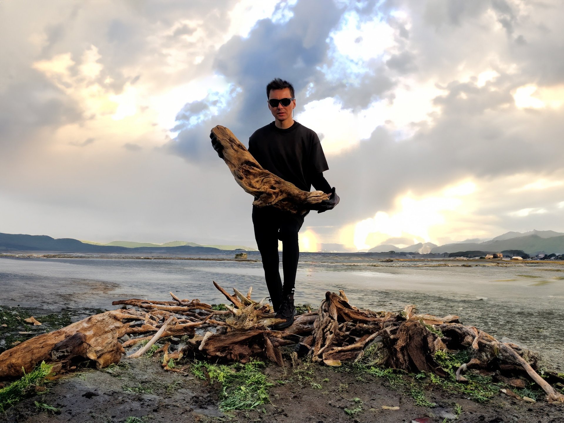 an abstract photo of a curved building with a blue sky in the background