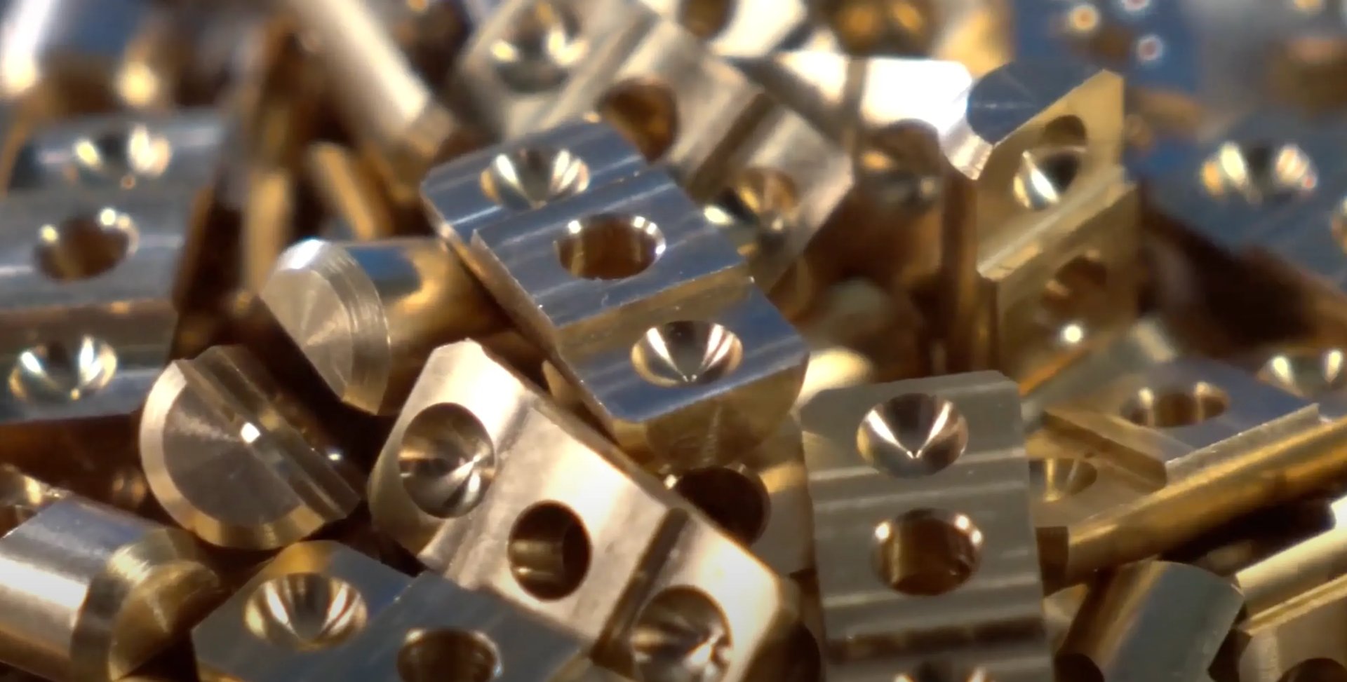 an abstract photo of a curved building with a blue sky in the background