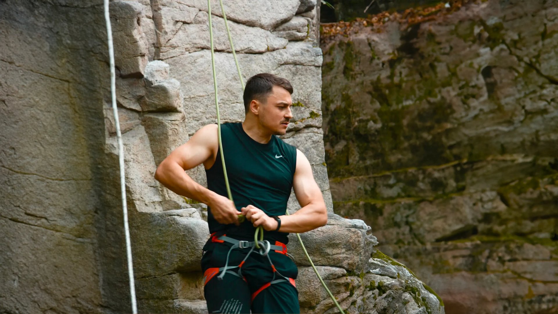 an abstract photo of a curved building with a blue sky in the background