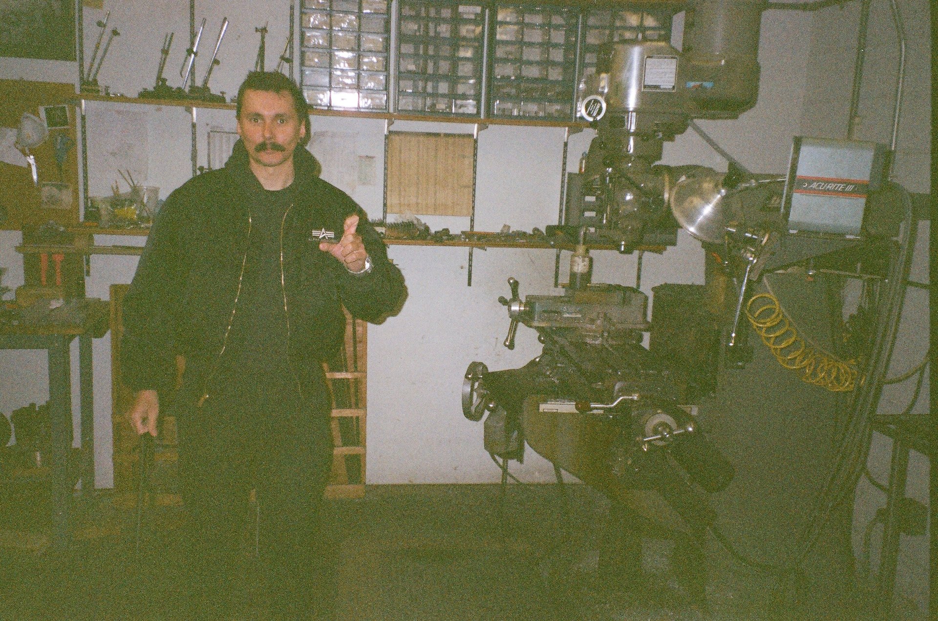 an abstract photo of a curved building with a blue sky in the background