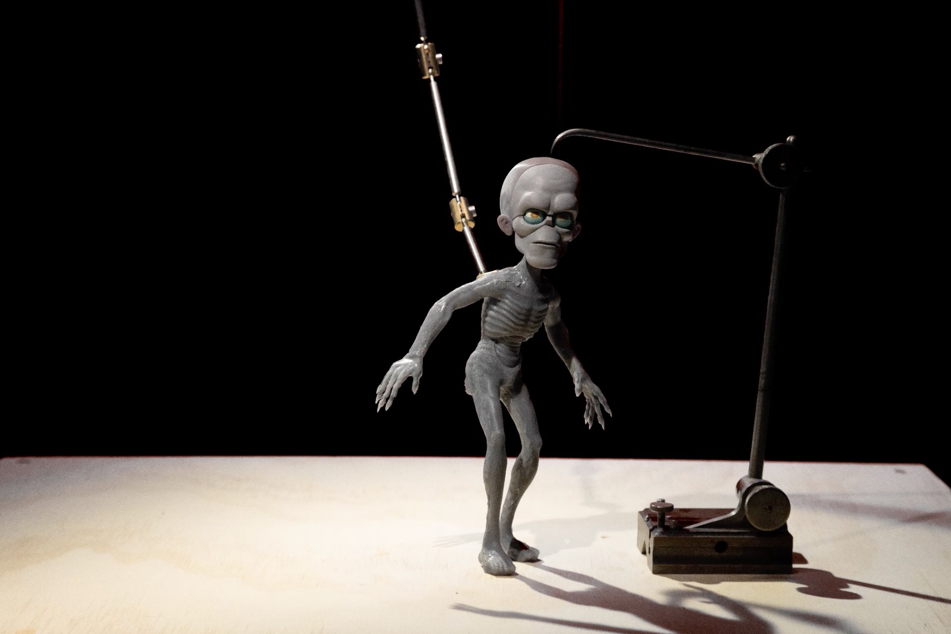 an abstract photo of a curved building with a blue sky in the background