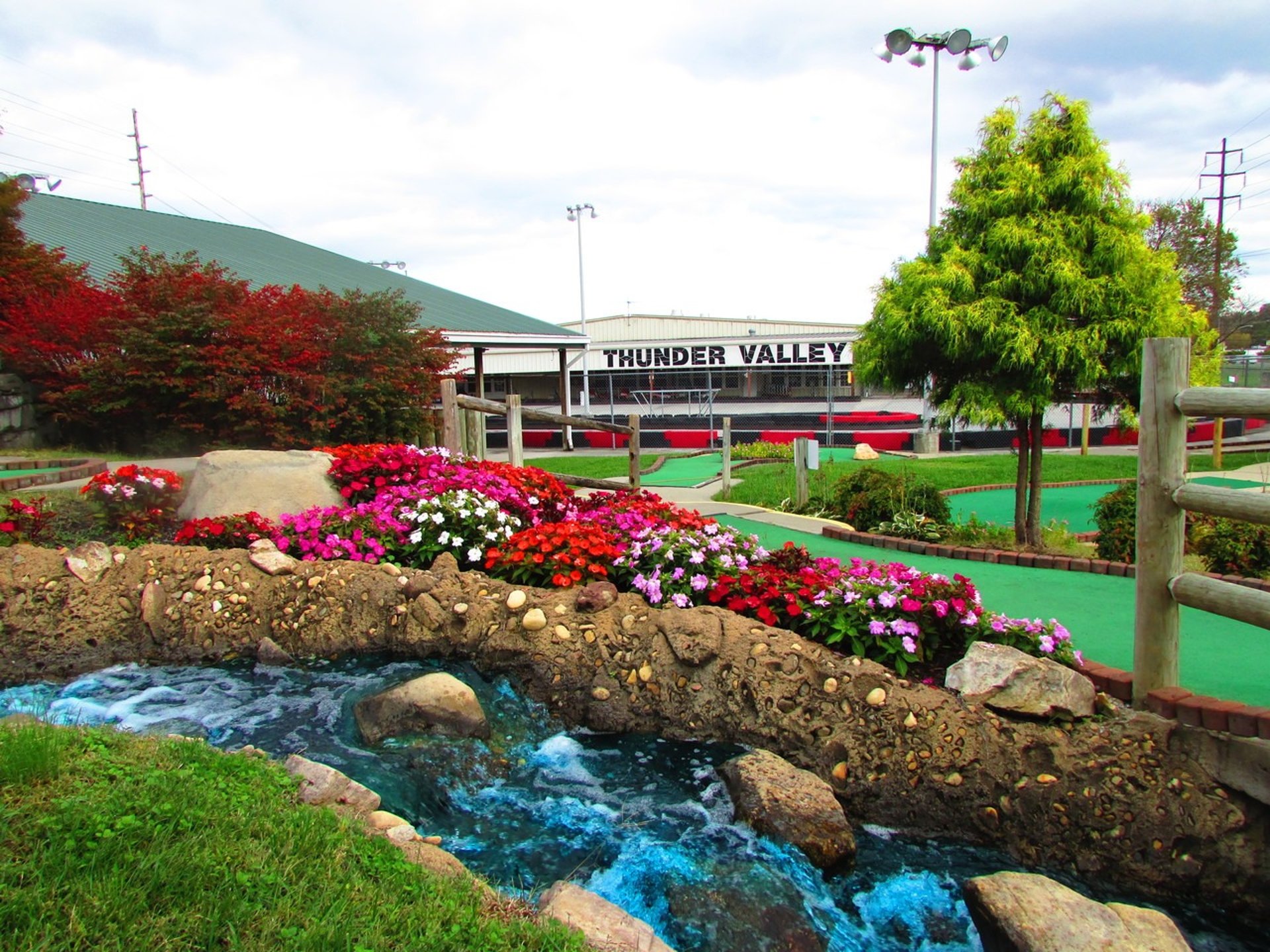 mini golf course with Thunder Valley sign in background