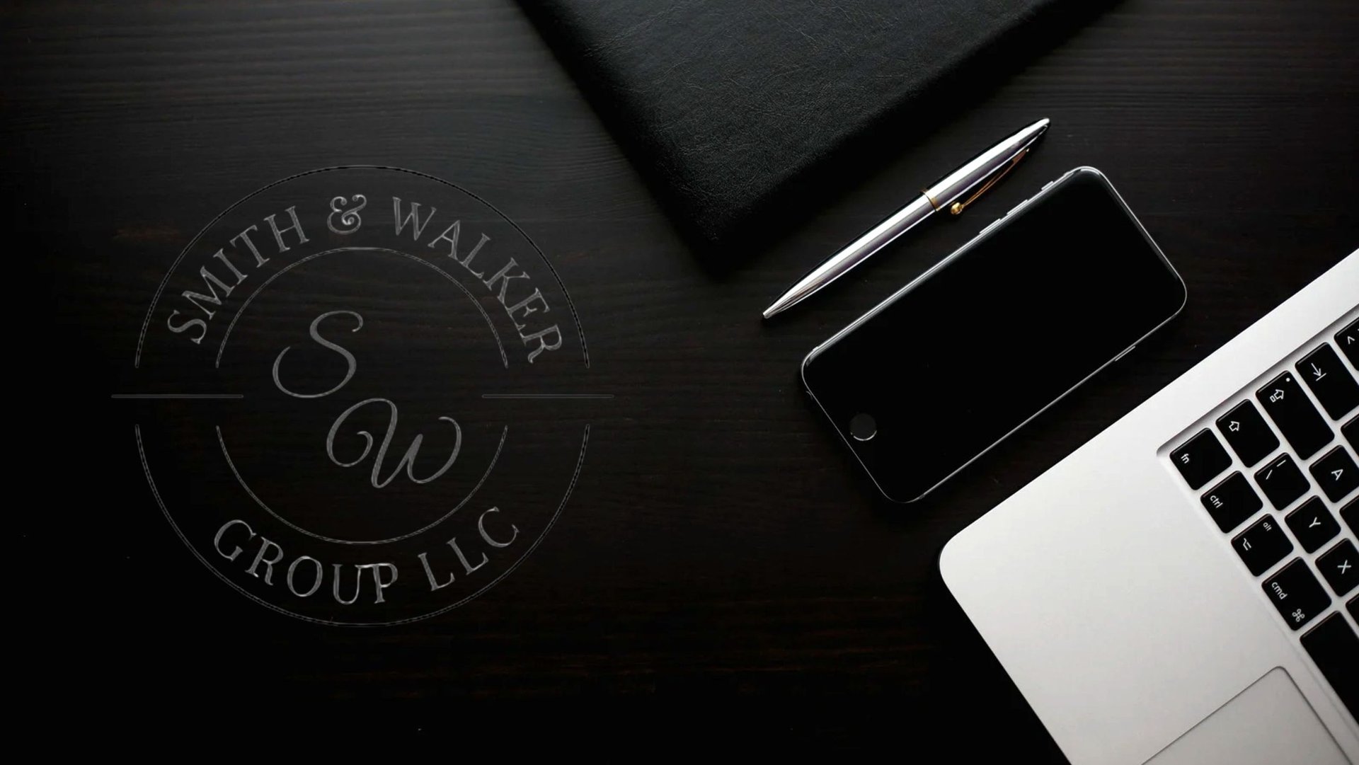 a close up of a black and brown abstract painting