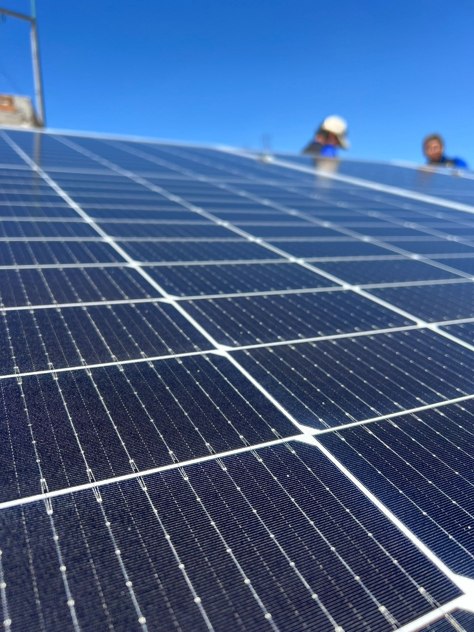 woman wearing yellow long-sleeved dress under white clouds and blue sky during daytime