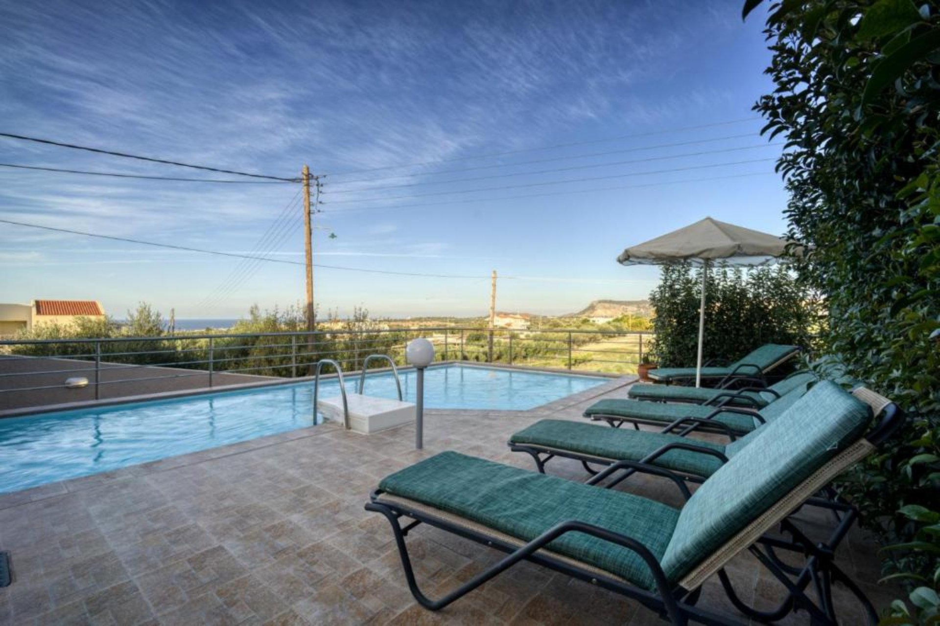 woman wearing yellow long-sleeved dress under white clouds and blue sky during daytime