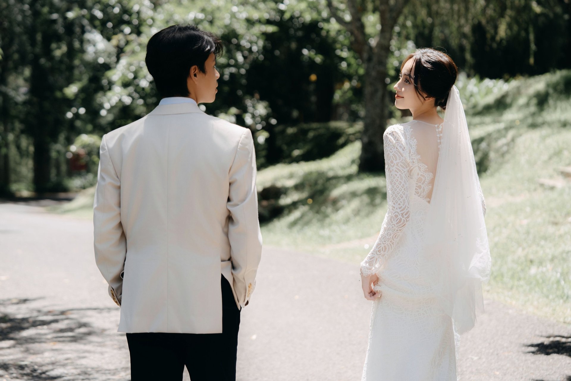 an abstract photo of a curved building with a blue sky in the background