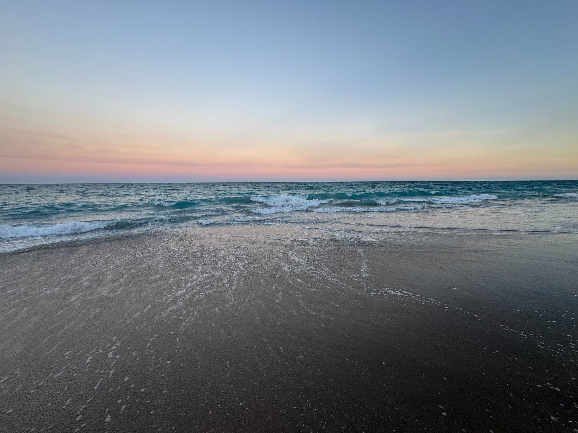 Mother and daughter looking at laptop together