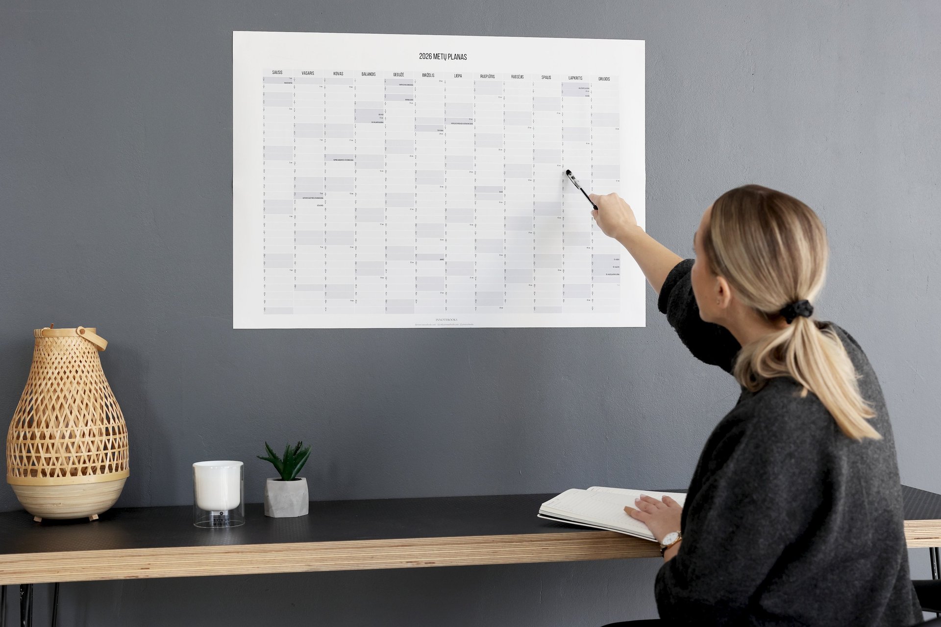 person wearing grey knit sweater