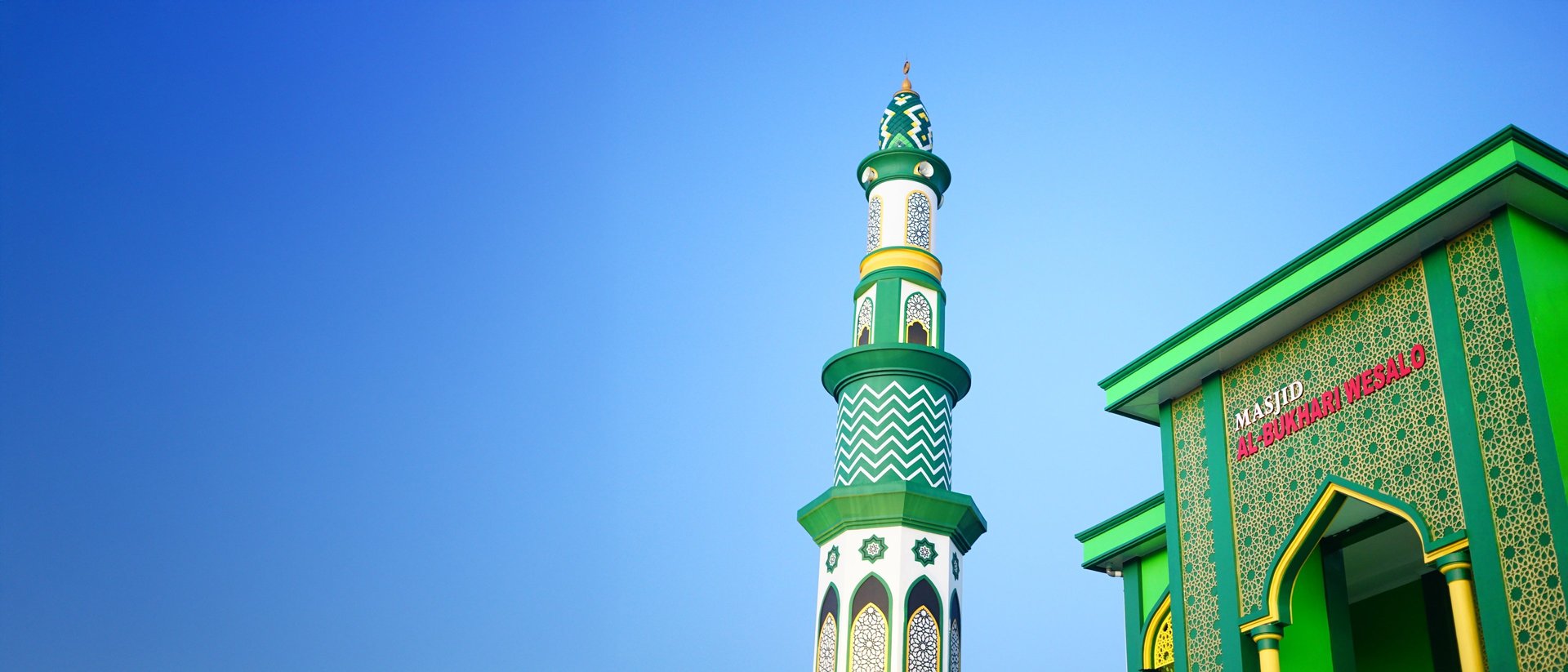an aerial view of a large white building