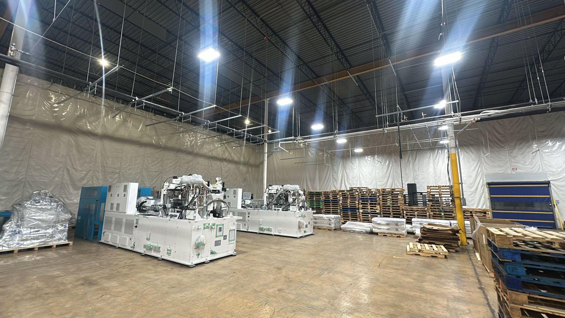 Modern apartment building facade with repeating balconies.
