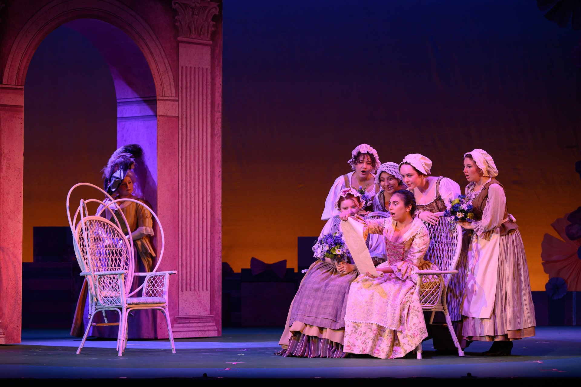 an abstract photo of a curved building with a blue sky in the background