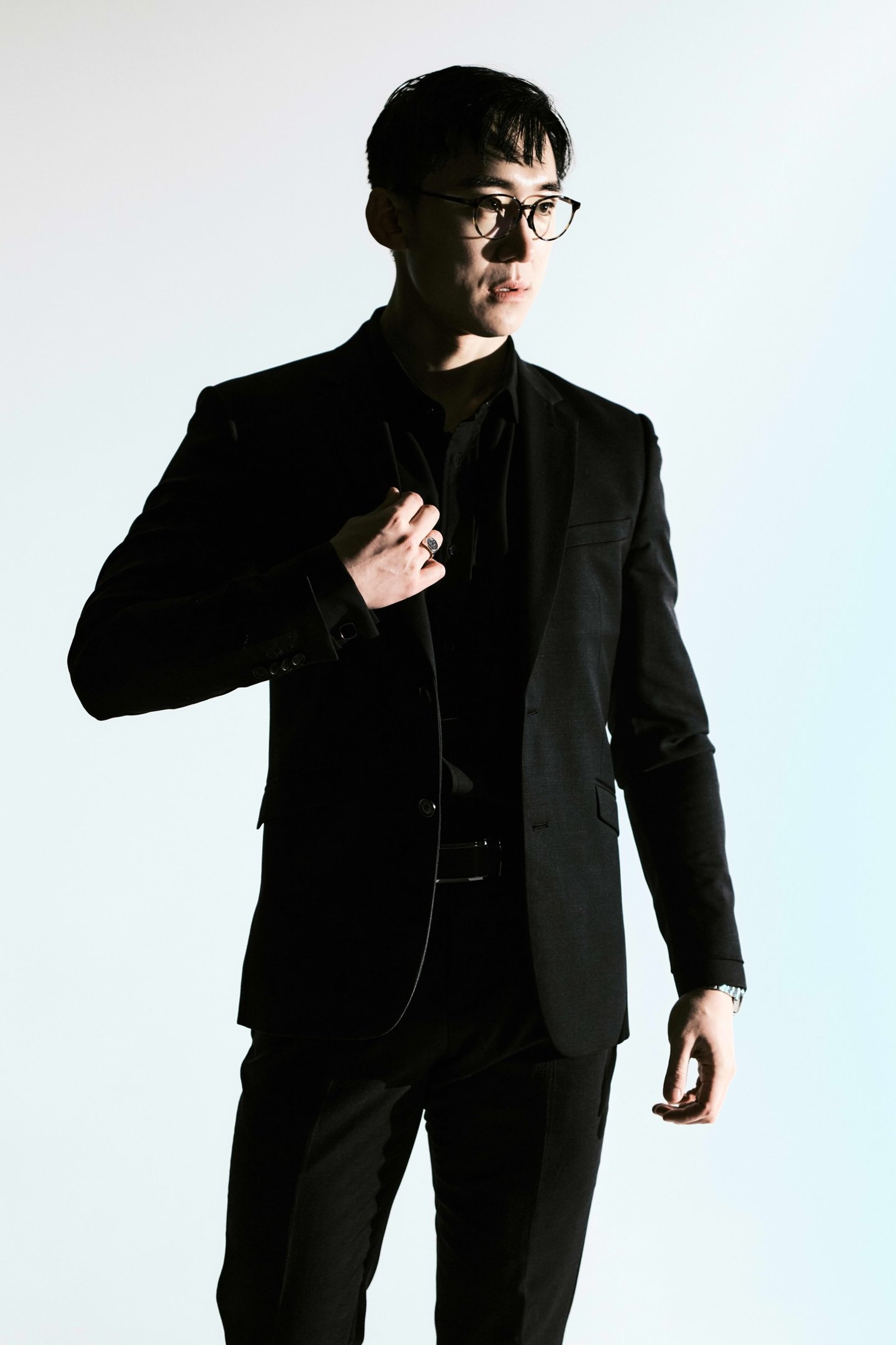 an abstract photo of a curved building with a blue sky in the background