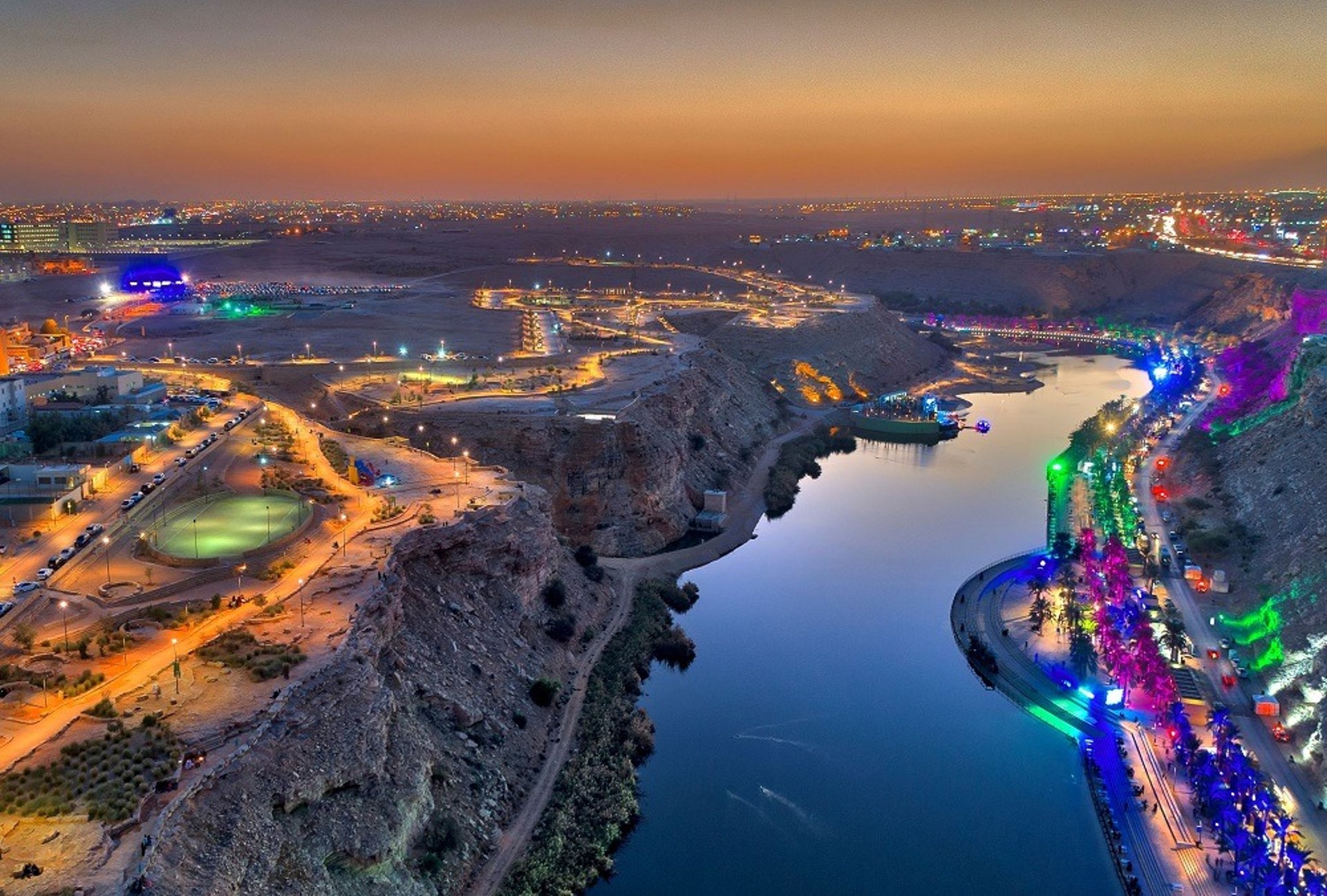 woman wearing yellow long-sleeved dress under white clouds and blue sky during daytime