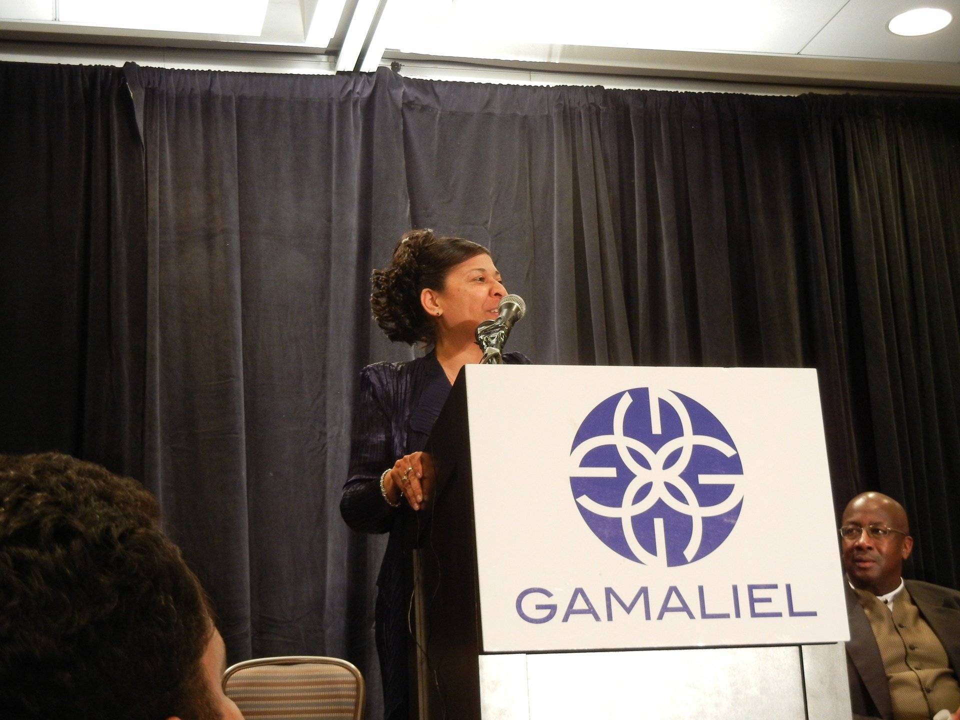 woman wearing yellow long-sleeved dress under white clouds and blue sky during daytime