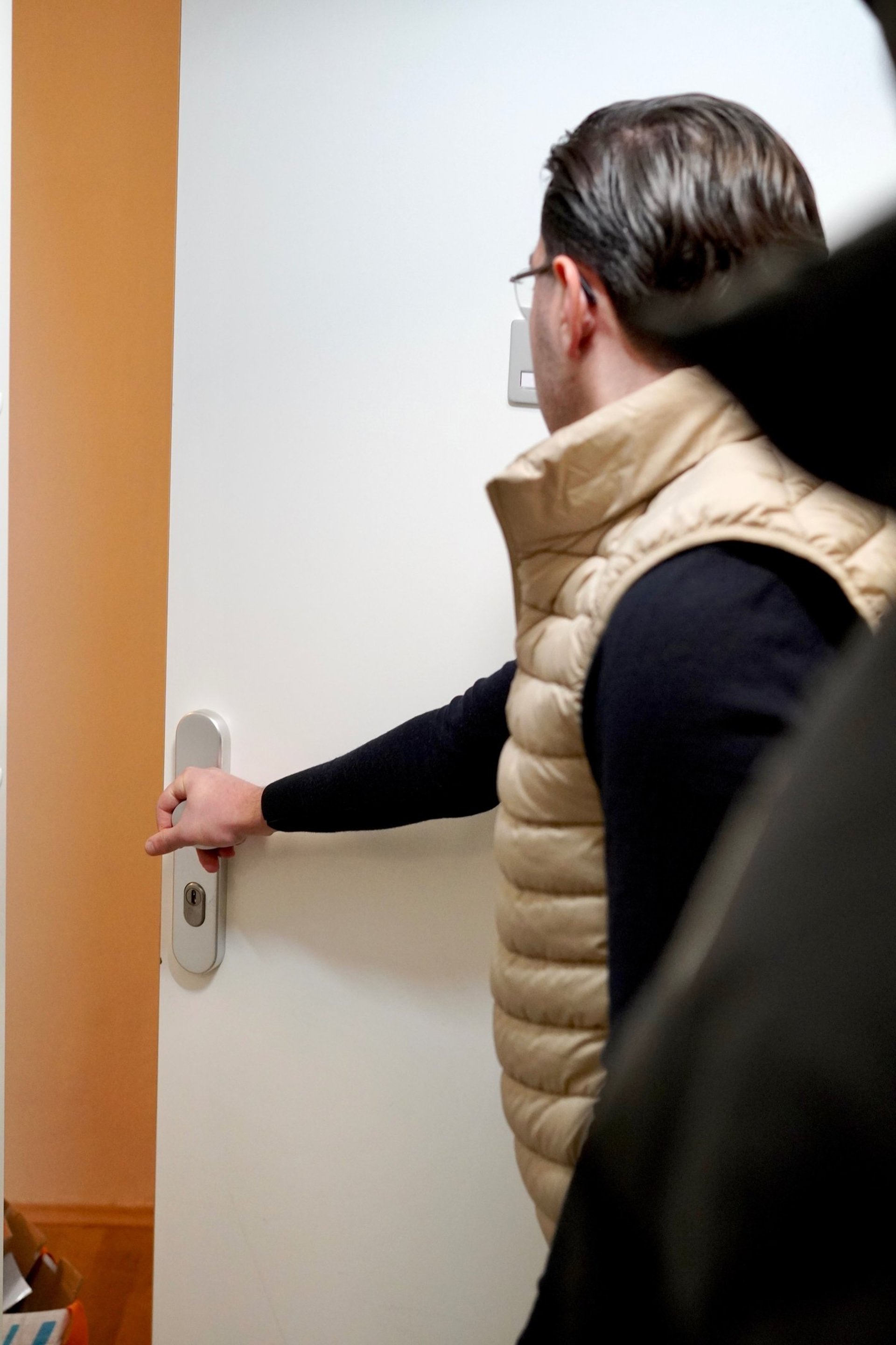 person holding white Android smartphone in white shirt