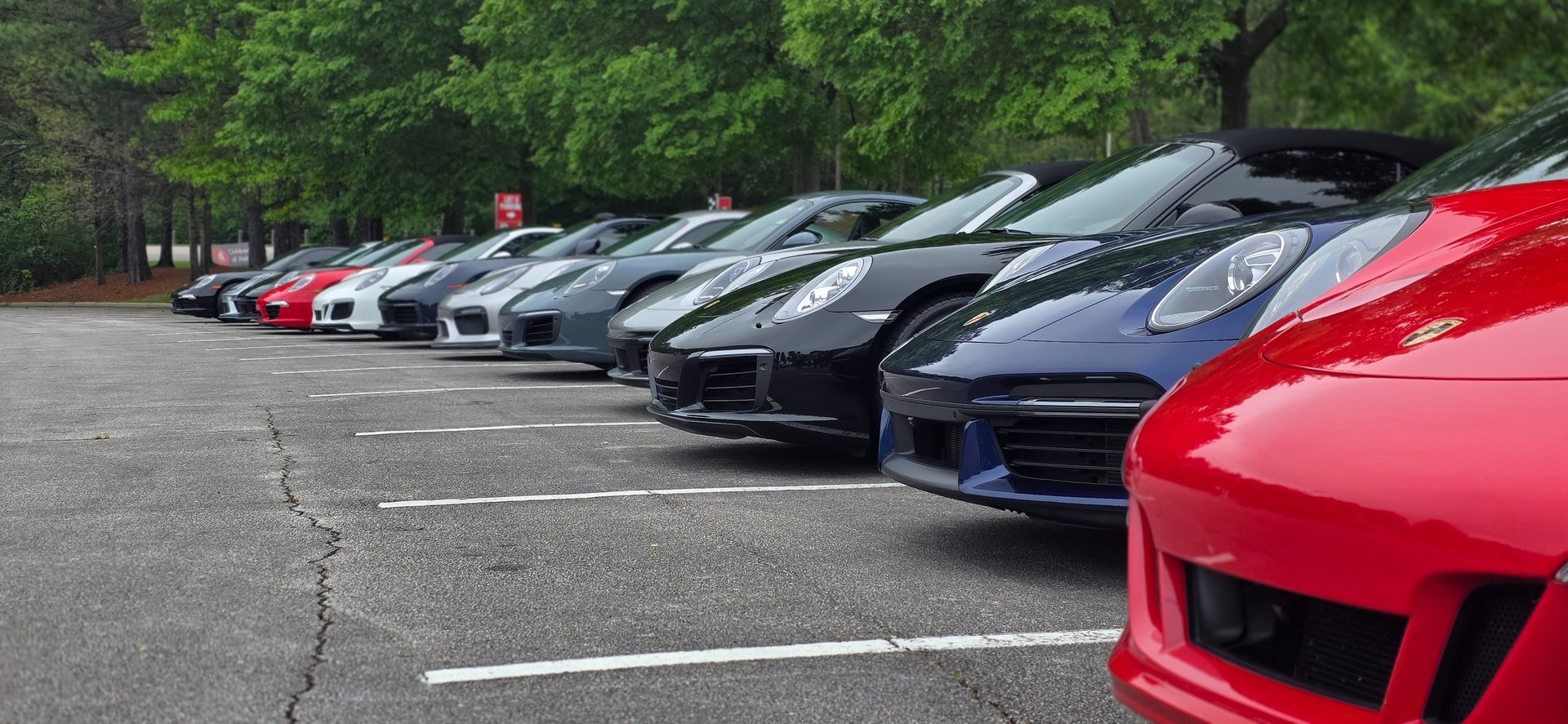 an abstract photo of a curved building with a blue sky in the background