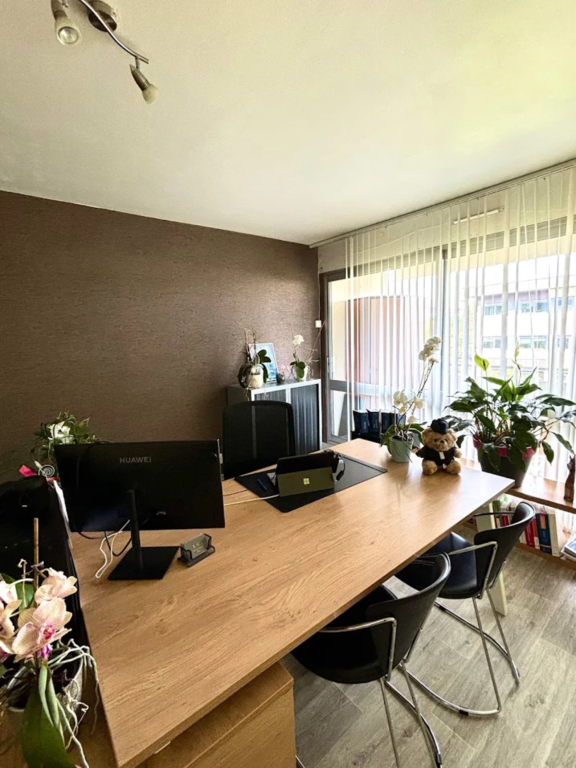 brown wooden 9-piece office table and chairs