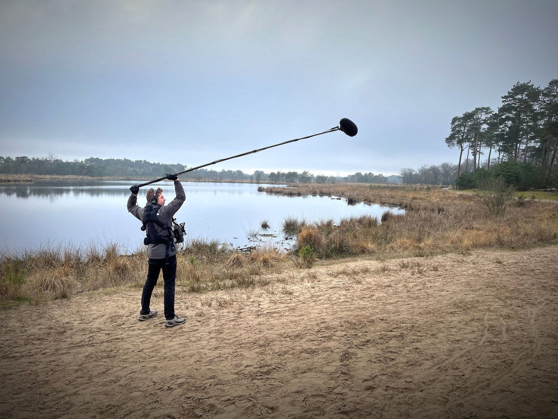 an abstract photo of a curved building with a blue sky in the background