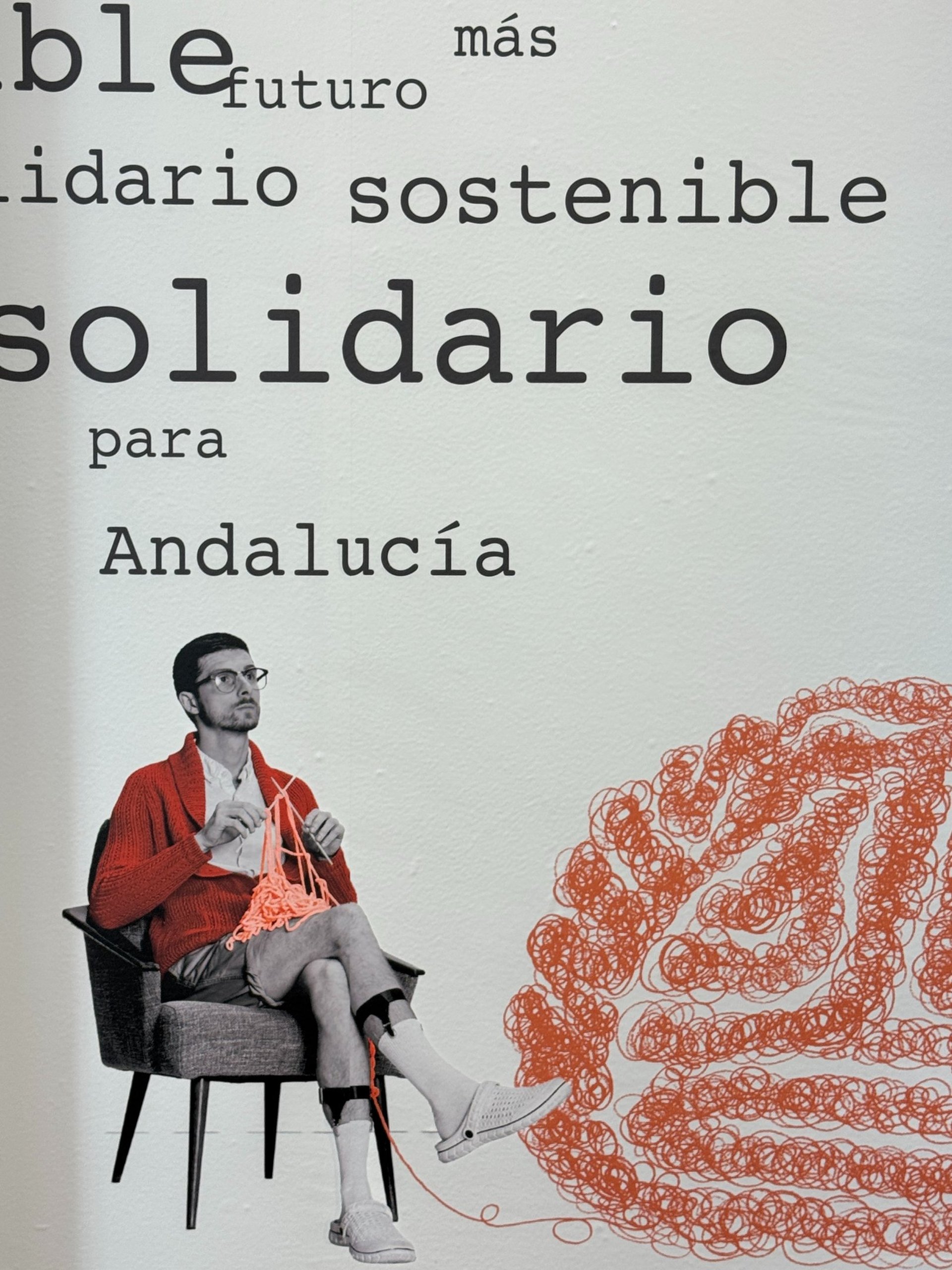 an abstract photo of a curved building with a blue sky in the background