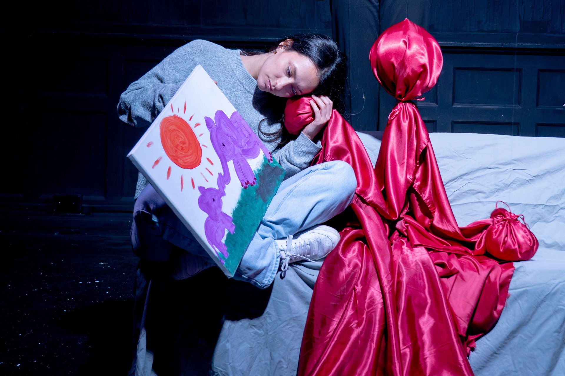 an abstract photo of a curved building with a blue sky in the background